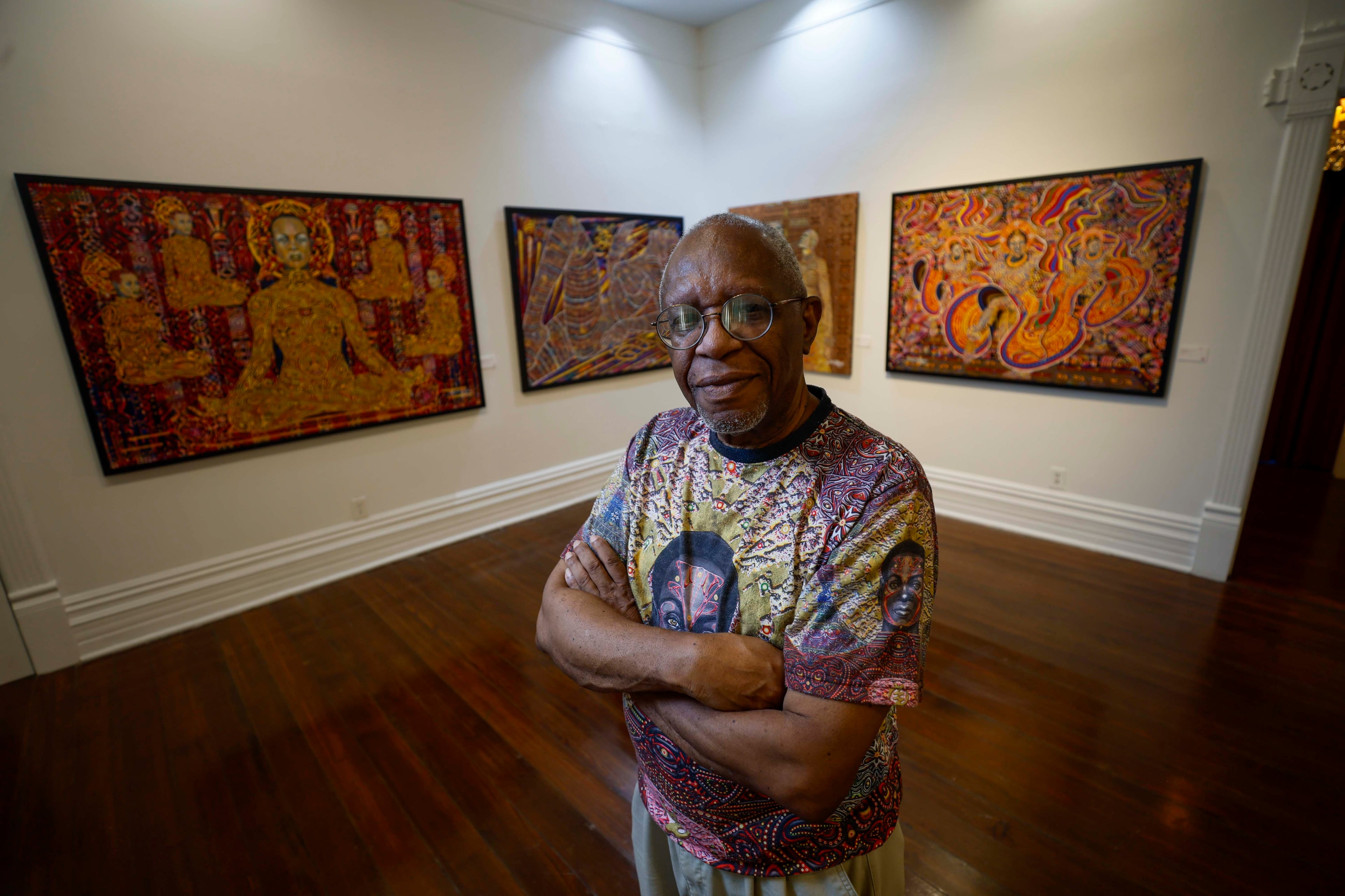 Visual artist Steve Allen poses on the first floor of one of his exhibits at the Hammonds House Museum on Thursday, August 20, 2026. (Miguel Martinez/AJC)