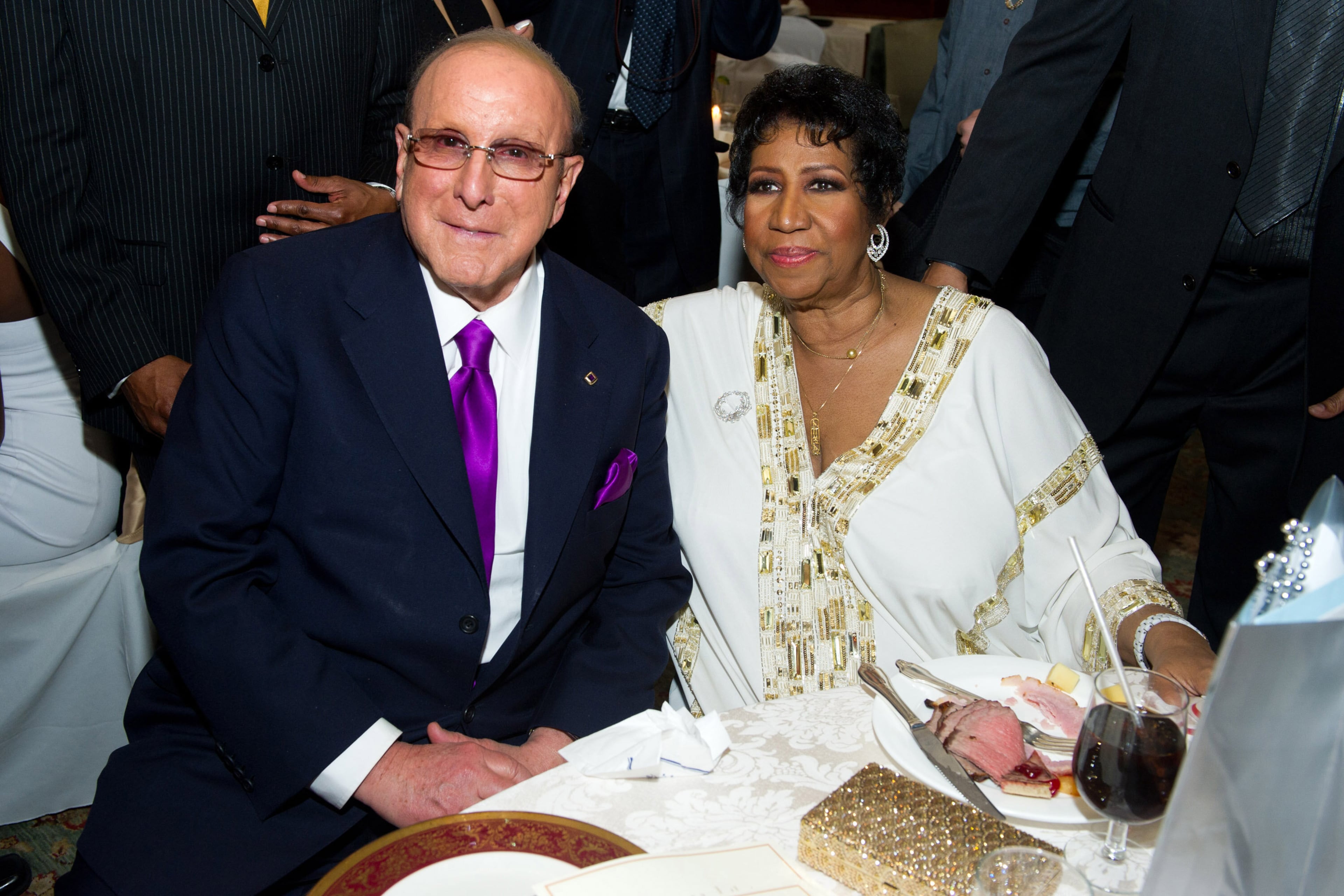 Clive Davis (left) attends the 69th birthday party for Aretha Franklin in 2011. (Charles Sykes/AP 2011)