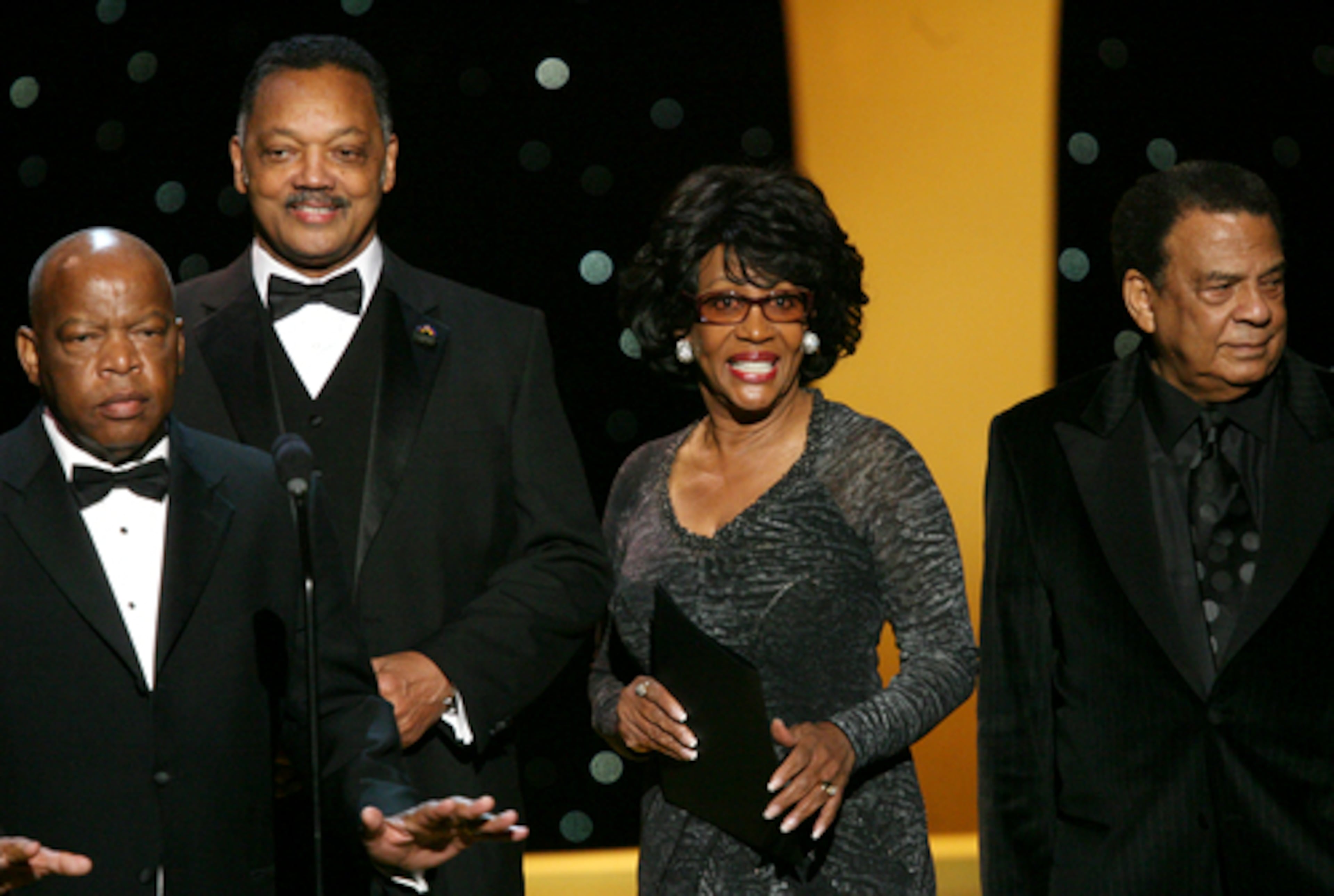 (From left) U.S. Rep. John Lewis, Rev. Jesse Jackson, U.S. Rep. Maxine Waters, and Ambassador Andrew Young, take the stage together at the Trumpet Awards. (Jenni Girtman for the AJC)