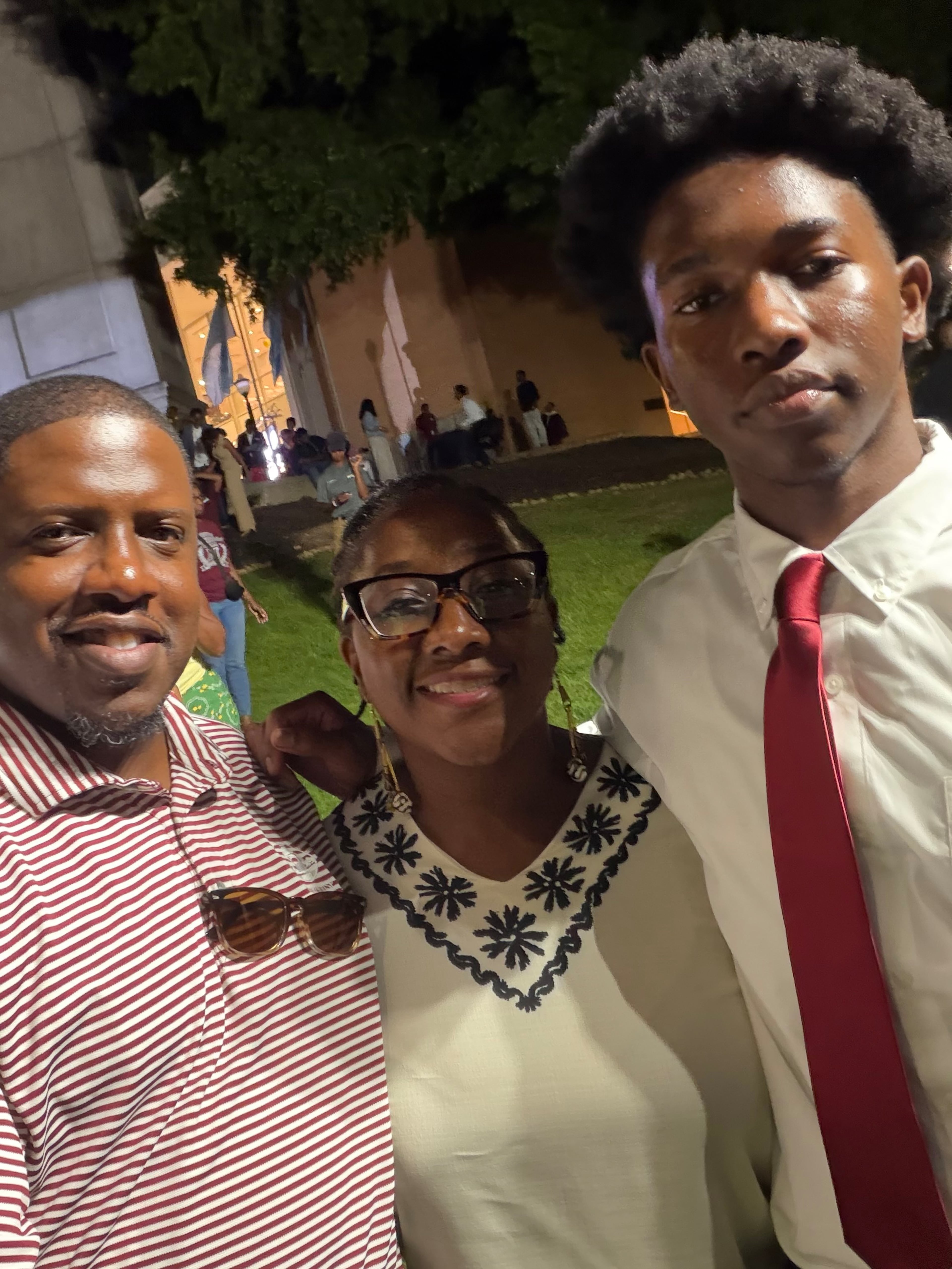 Incoming Morehouse College freshman Evan Parker (right) poses with parents Sarquis Parker (left) and Keilani Parker (center) at the school's Parents' Parting Ceremony on Aug. 14, 2026. Evan is a second-generation Morehouse College student, following his father, who was in the Class of 1998. Evan's mother is Spelman College Class of 1998. (Courtesy of Keilani Parker)