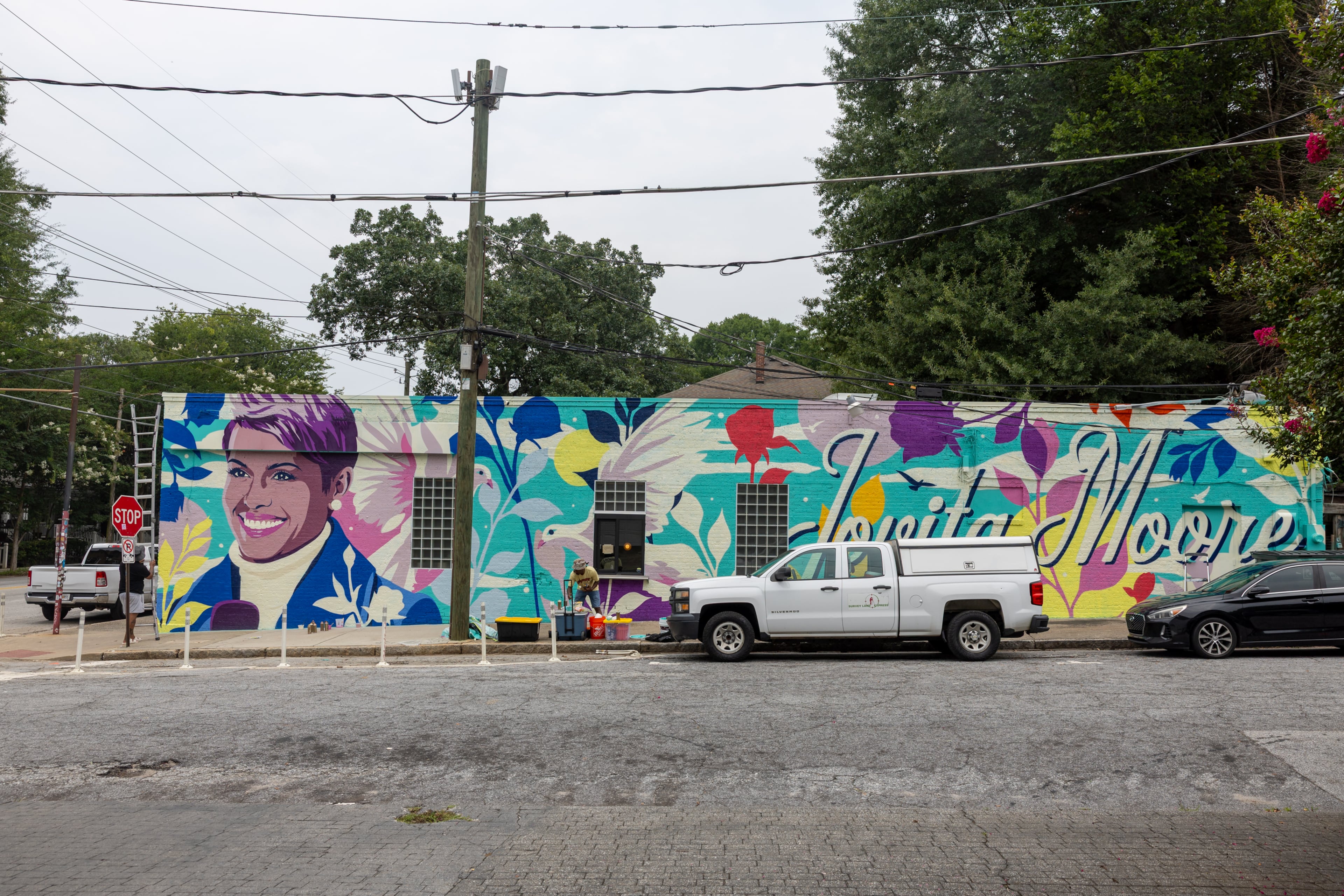 This new mural honors the late news anchor Jovita Moore on the side of Bellwood Coffee in Atlanta on Wednesday, July 29, 2026. The coffee shop created community outcry when it painted over the original mural of Moore. (Arvin Temkar/AJC)