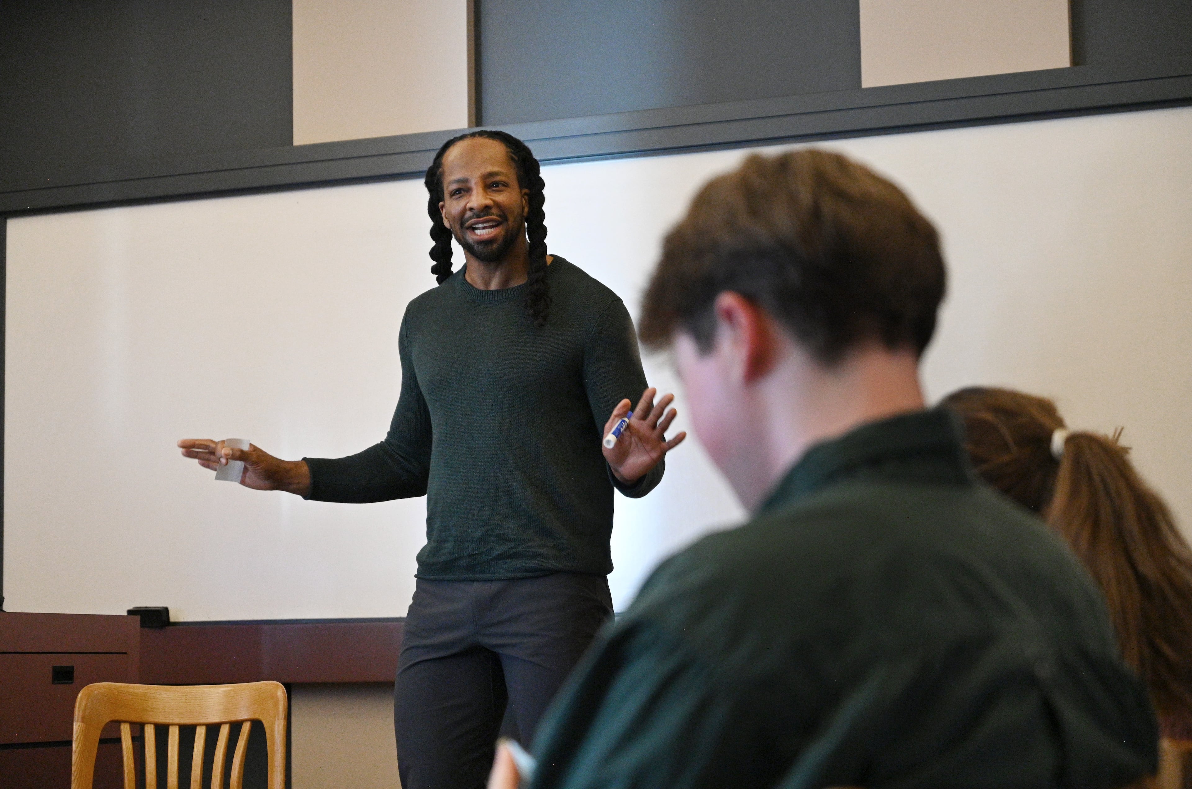 Pulitzer Prize winner Jericho Brown, pictured teaching a class at Emory University in Atlanta in 2024, is one of contemporary literature’s most acclaimed poets. (Hyosub Shin/AJC)