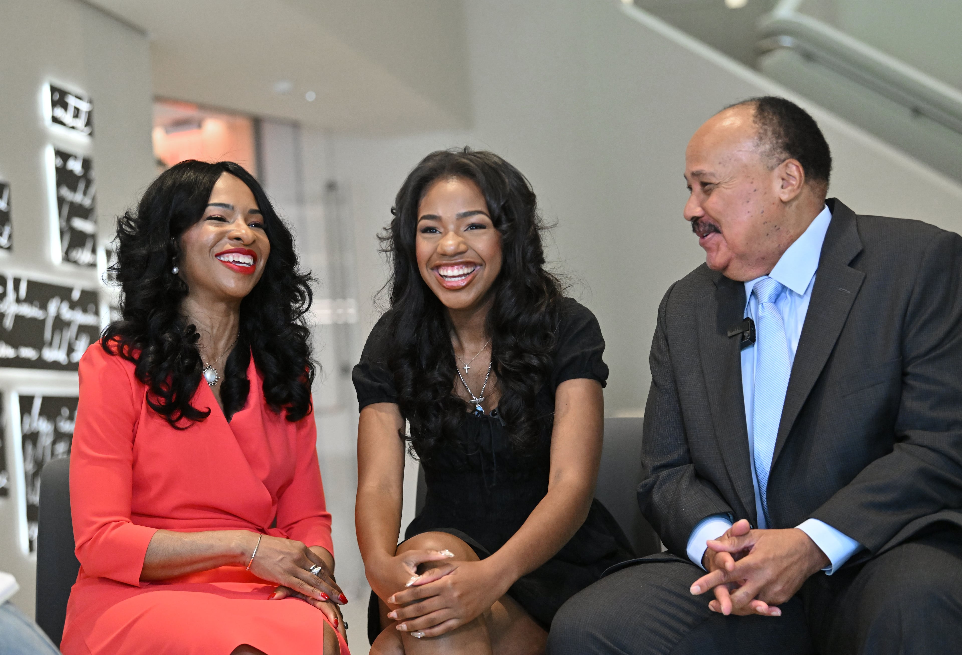 The King family — Martin Luther King III, wife Arndrea Waters King, and daughter Yolanda Renee King — reacts during an interview with Atlanta Black Culture Reporter Brooke Howard at the National Center for Civil and Human Rights on Friday, June 12, 2026, in Atlanta. (Hyosub Shin/AJC)