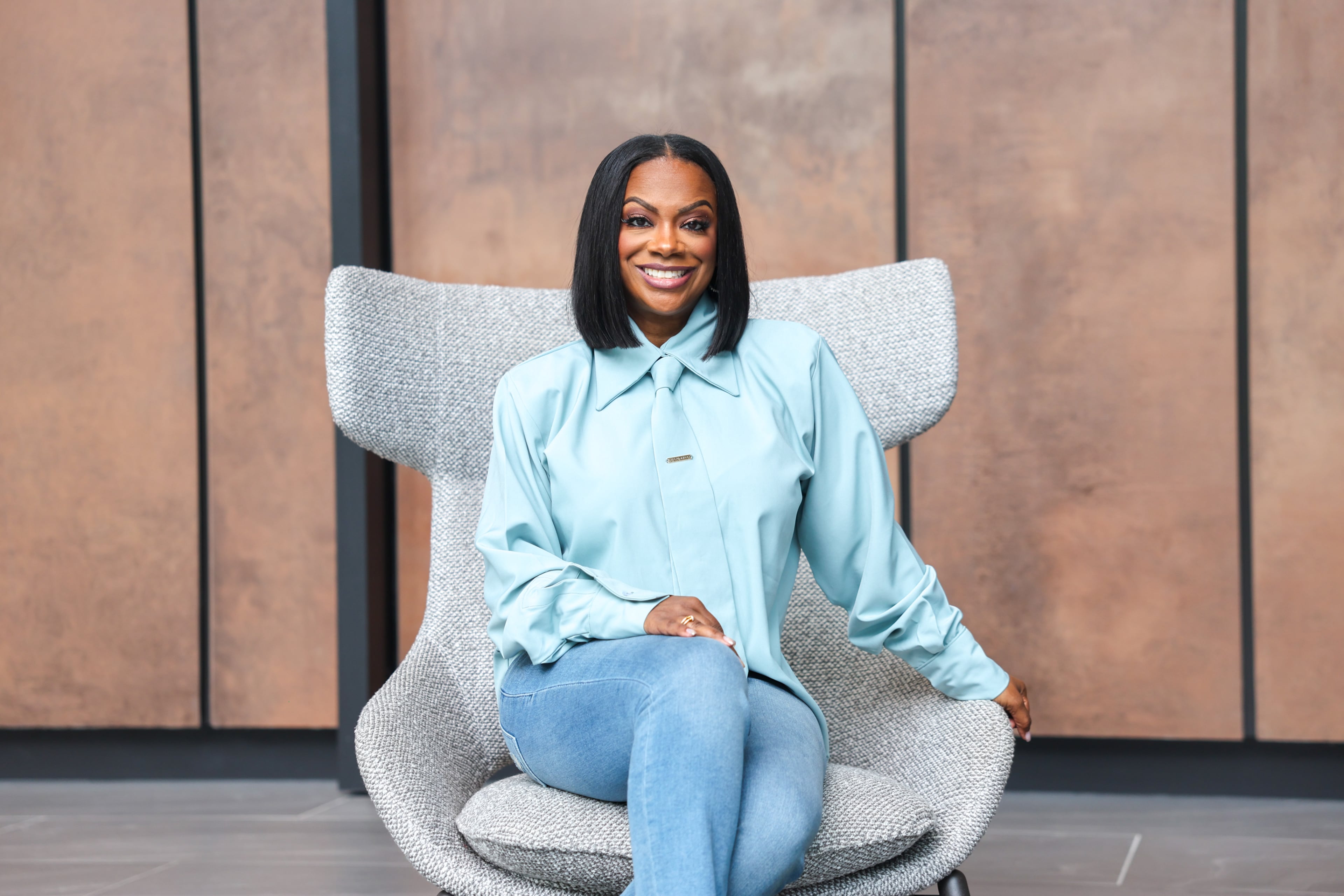 Actress and Grammy-winning songwriter Kandi Burruss sits for a portrait at the Atlanta Journal-Constitution office in Atlanta on May 8, 2026. (Arvin Temkar/AJC)