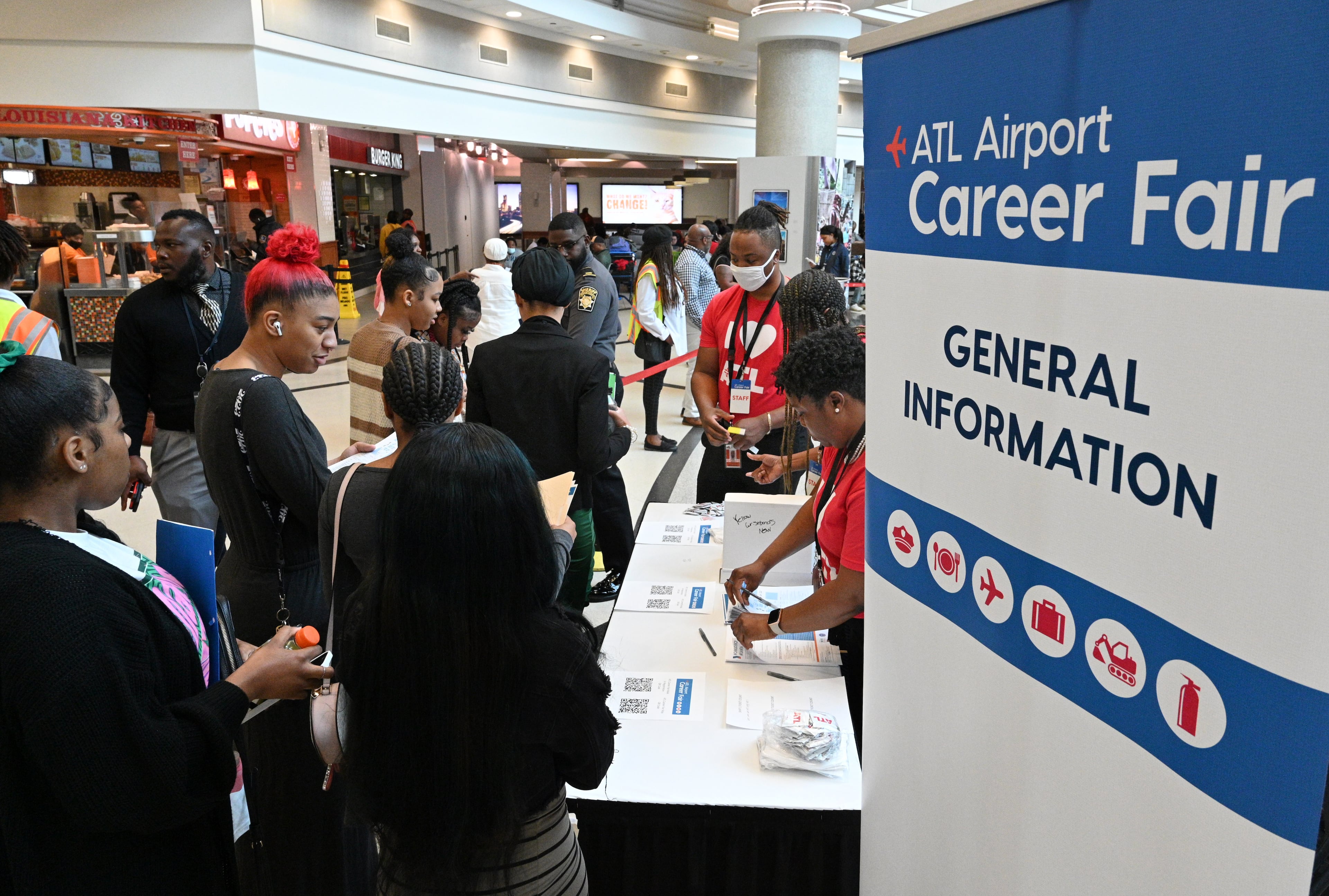Job seekers check in as they enter 2023 ATL Airport Career Fair at the domestic terminal atrium of Hartsfield-Jackson Atlanta International Airport, Wednesday, March 8, 2023, in Atlanta, GA. (Hyosub Shin/AJC)