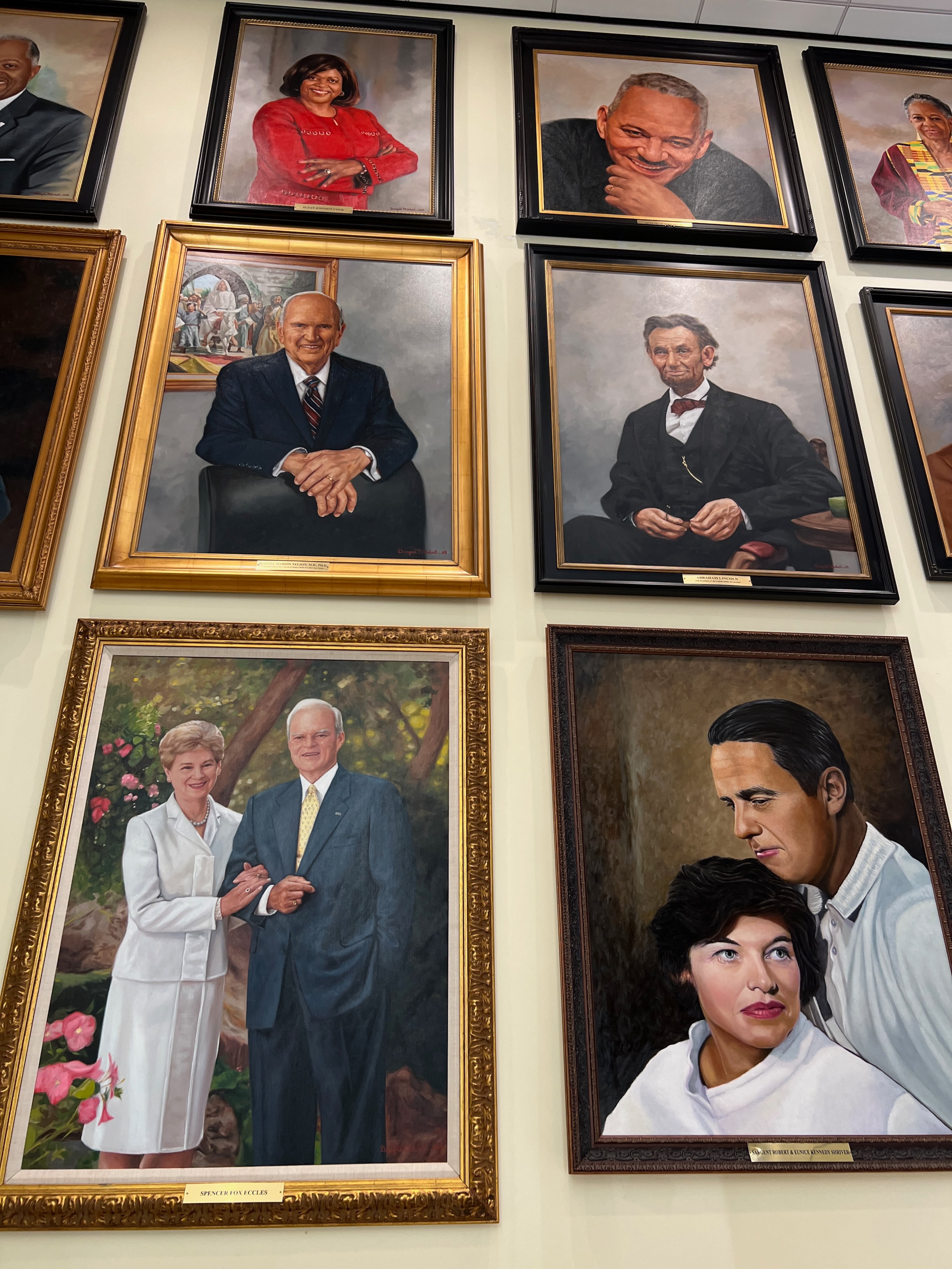 Not every portrait in the International Hall of Honor Is of a Black man. They include Abraham Lincoln, Bill Marriott Jr., Spencer Eccles and Russell Marion Nelson. (Mike Jordan/AJC)