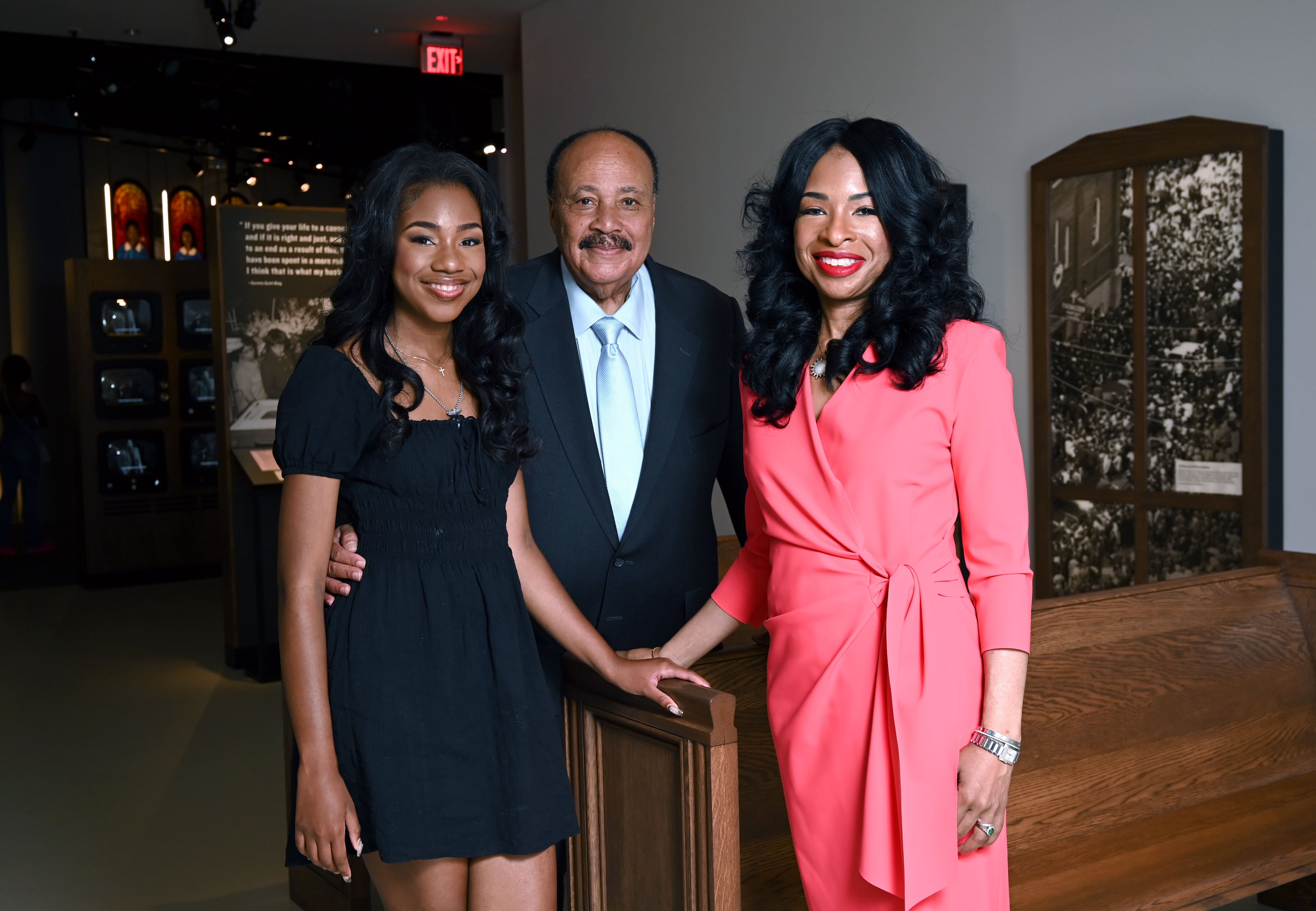 The King family — Martin Luther King III, wife Arndrea Waters King, and daughter Yolanda Renee King — pose for a portrait at the National Center for Civil and Human Rights on Friday, June 12, 2026, in Atlanta. (Hyosub Shin/AJC)