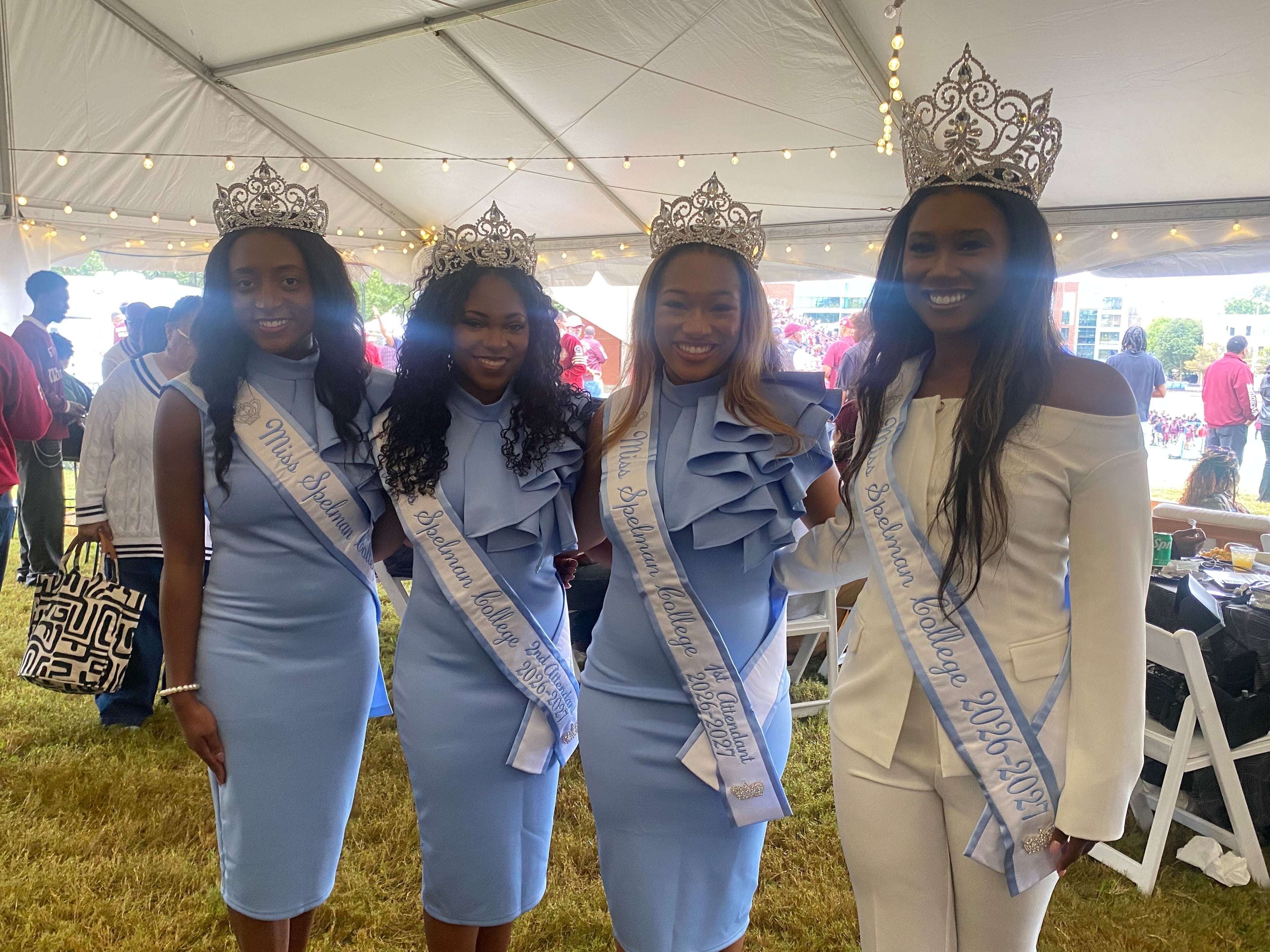 Miss Spelman College Jillian Collier (far right) with her court at B. T. Harvey Stadium for Spelman and Morehouse colleges shared homecoming on Oct. 11, 2026. From L to R: 3rd Attendant to Miss Spelman College Zaria Samuel, 2nd Attendant to Miss Spelman College Madison Corzine, 1st Attendant to Miss Spelman College Sarah Sloan. (Brooke Leigh Howard/AJC)