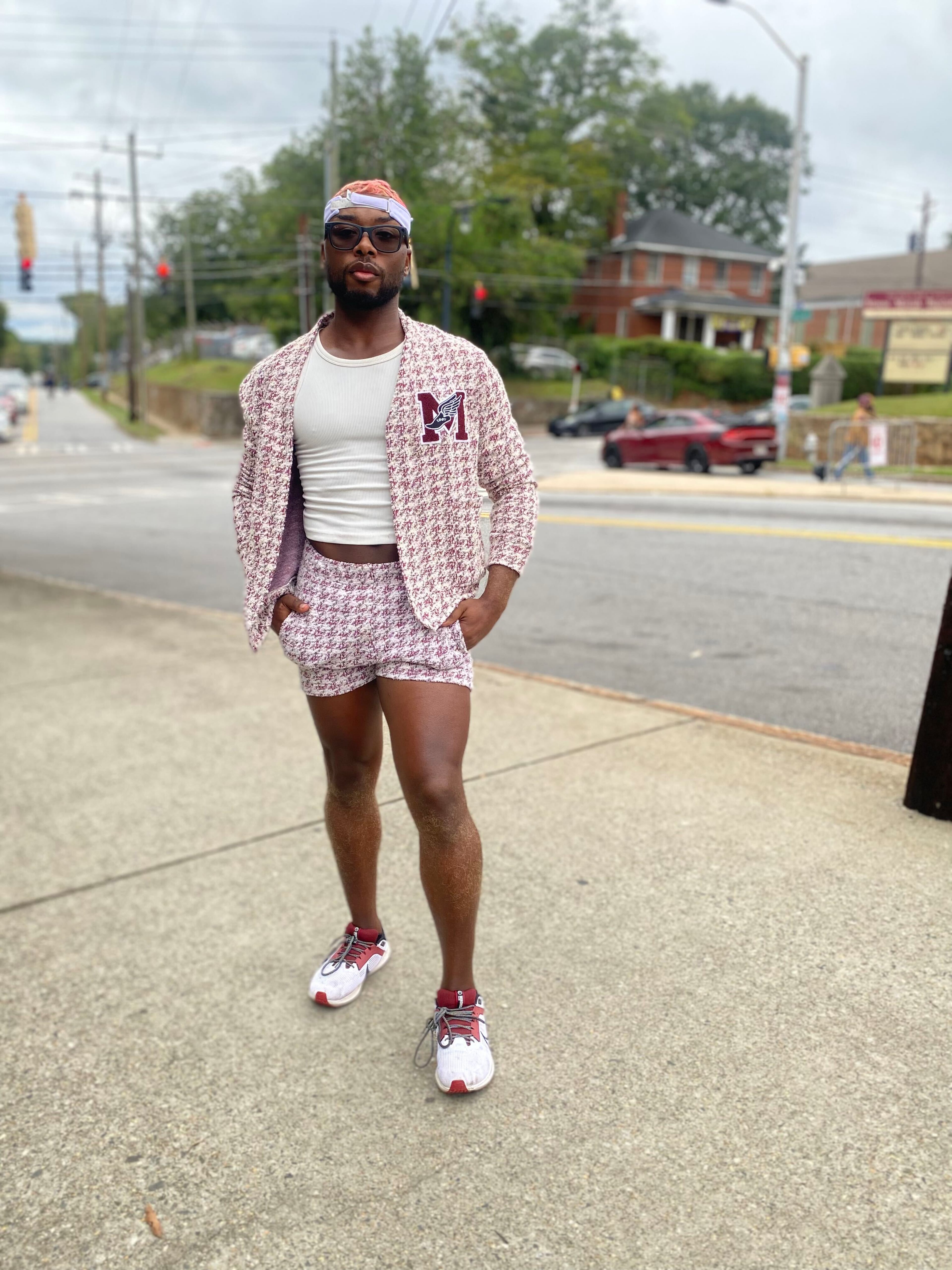 Morehouse College senior Kalon Suggs wears a boucle outfit from the luxury menswear Lee Rickie Collection for SpelHouse homecoming on Oct. 11, 2026. (Brooke Leigh Howard/AJC)