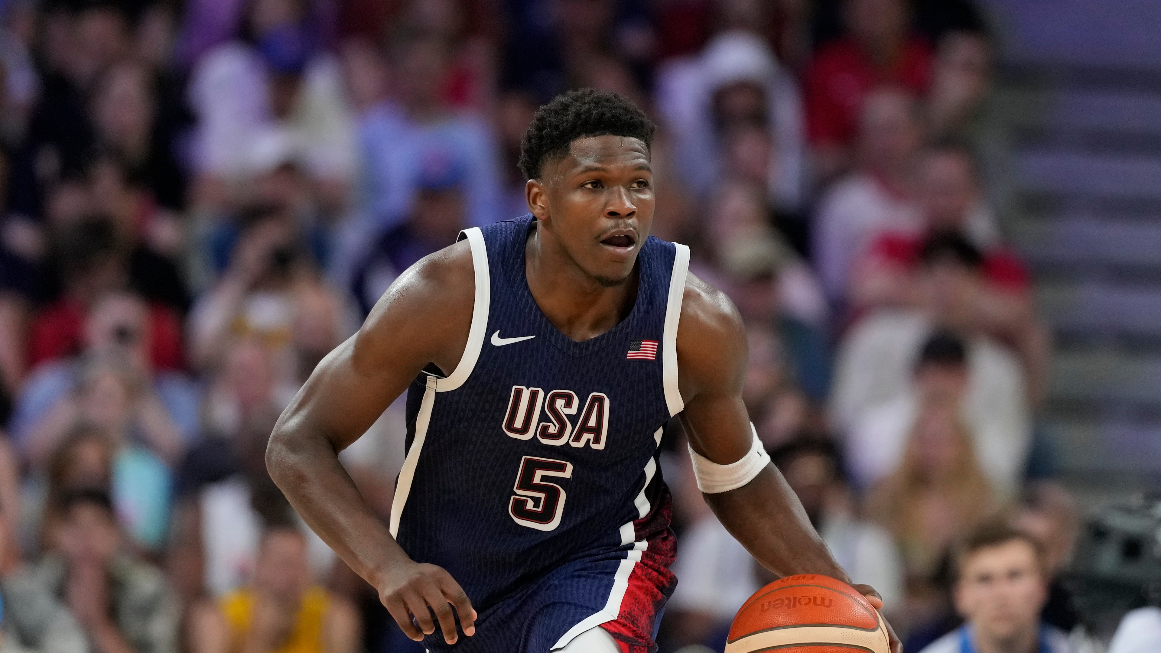 Anthony Edwards, of the United States, dribbles in a men's basketball game against Serbia at the 2024 Summer Olympics, Sunday, July 28, 2024, in Villeneuve-d'Ascq, France. (Michael Conroy/AP)