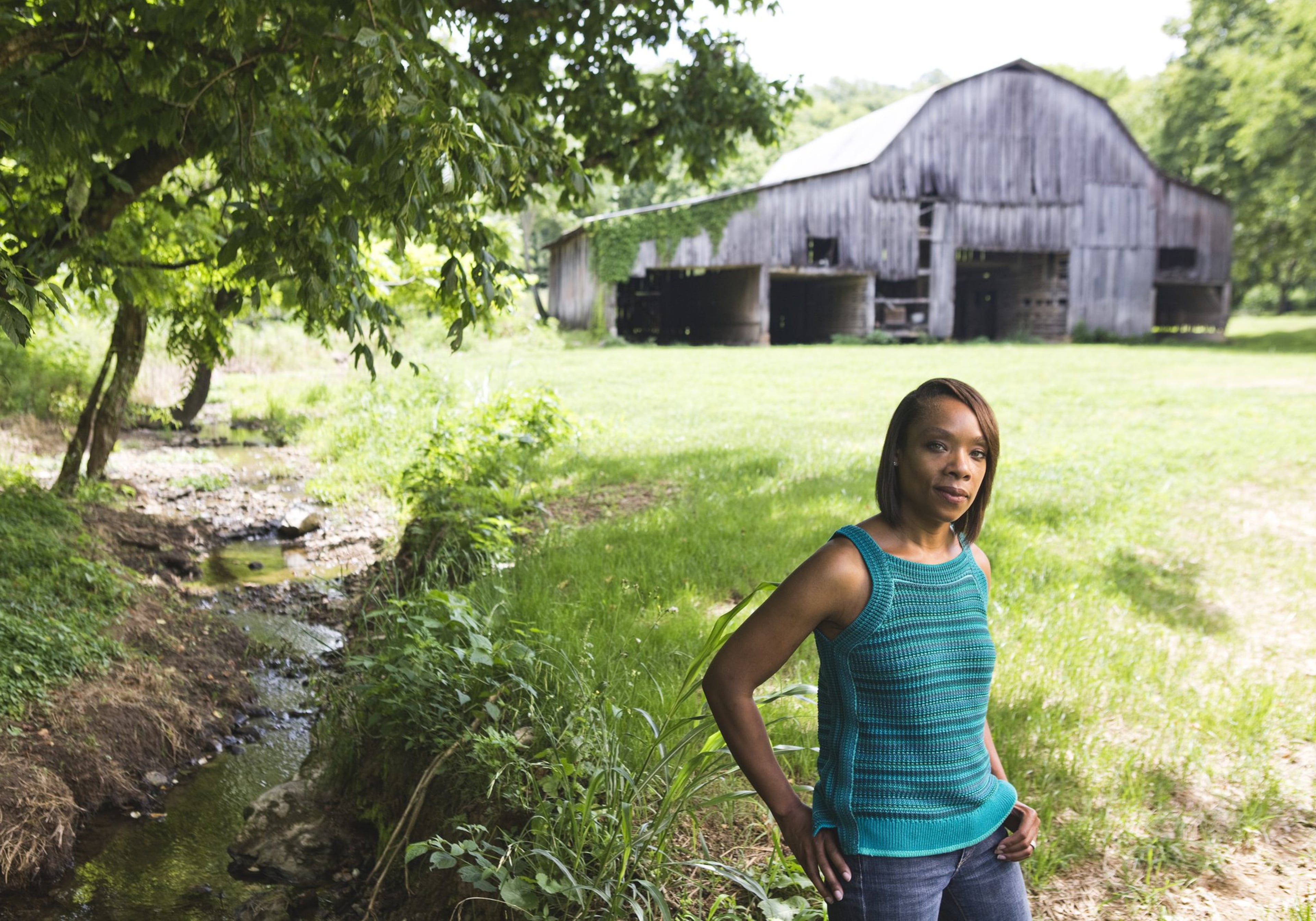 Fawn Weaver stands on a farm where Nathan “Nearest” Green and Jack Daniel first distilled whiskey together in the late 1800s.(Nathan Morgan/The New York Times 2017)