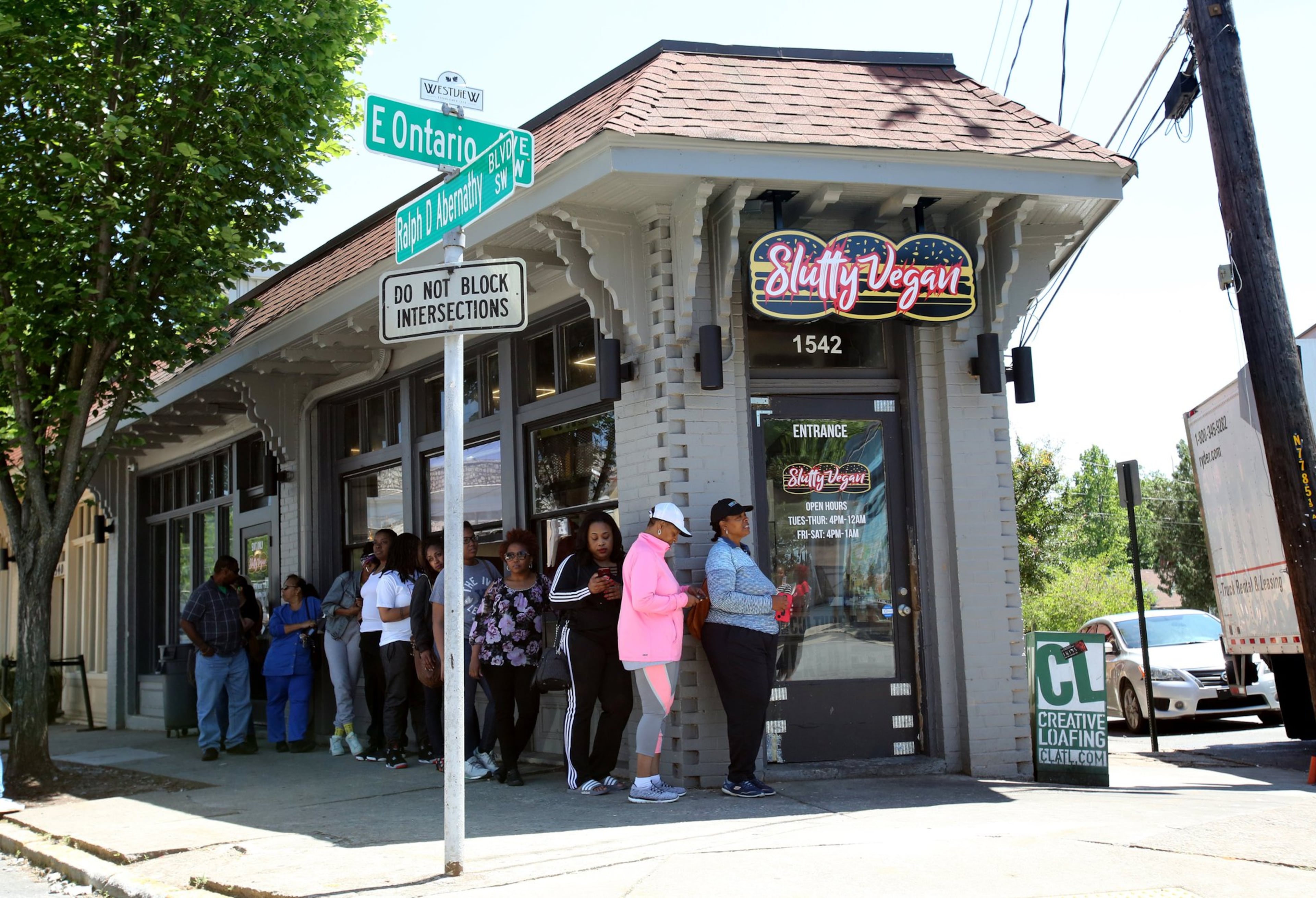 Customers line up outside Slutty Vegan for a naughty-named meatless burger, like the One Night Stand or Menage a Trois. (Courtesy photo)