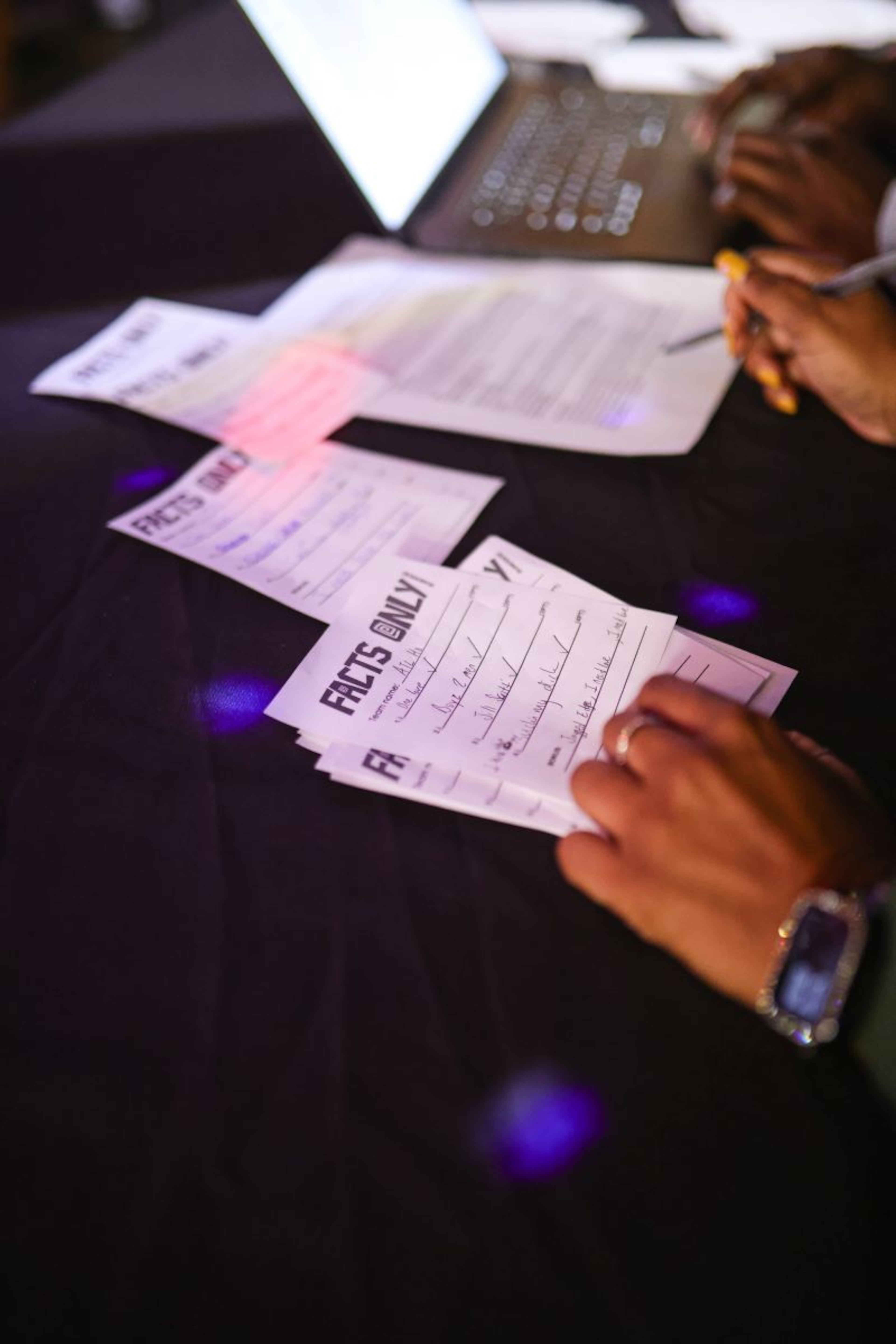 Facts Only Trivia is played in five rounds with karaoke and dance challenges while scores are tallied. (Courtesy of Fulani Jabri)