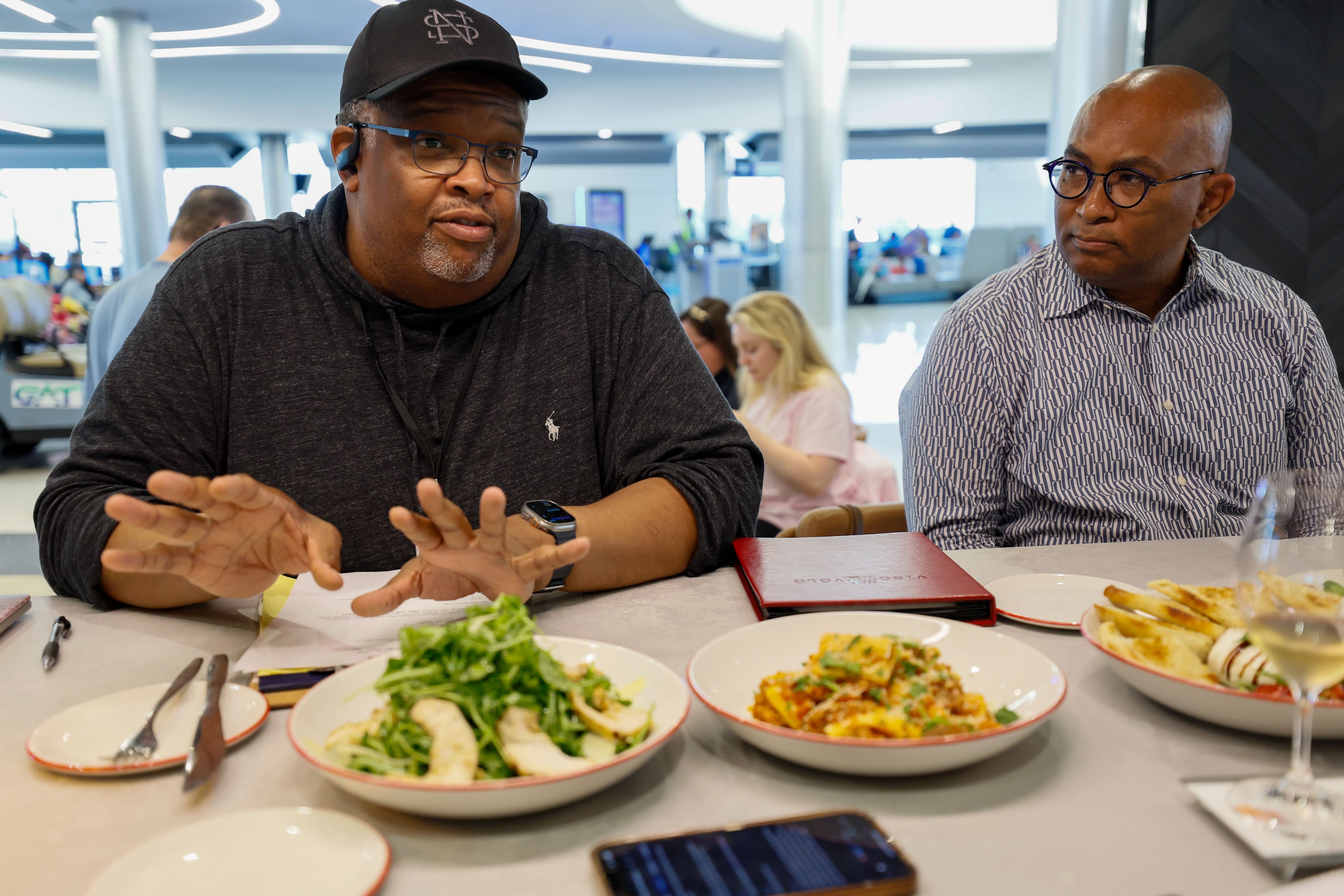 Chefs Duane Nutter (left) and Reginald Washington said they originally found better deals on restaurant space in Alabama and waited until summer 2023 to return to Atlanta, when terms were more favorable for the Black chefs. (Miguel Martinez/AJC 2024)
