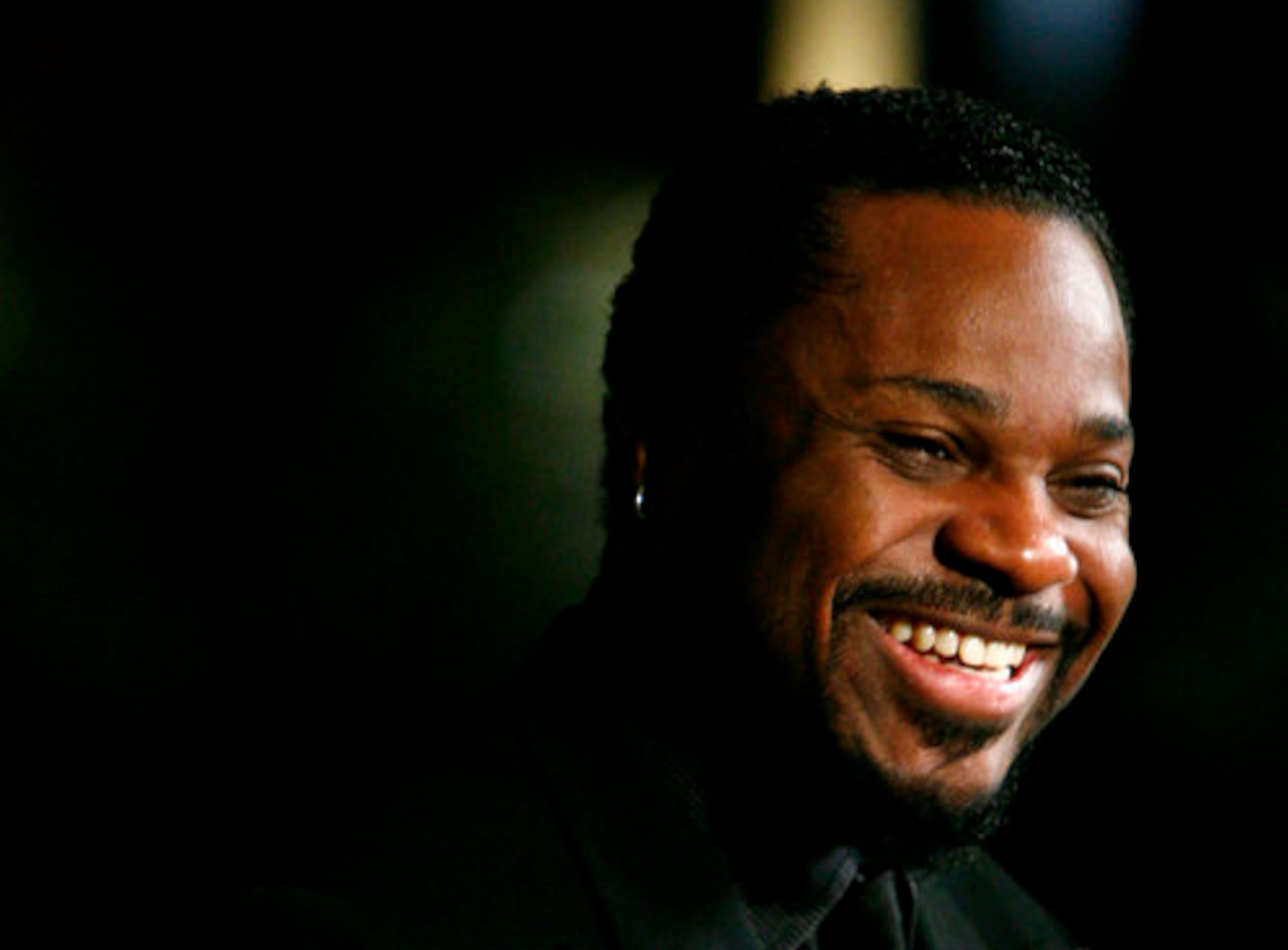Actor Malcolm-Jamal Warner is seen on the red carpet.