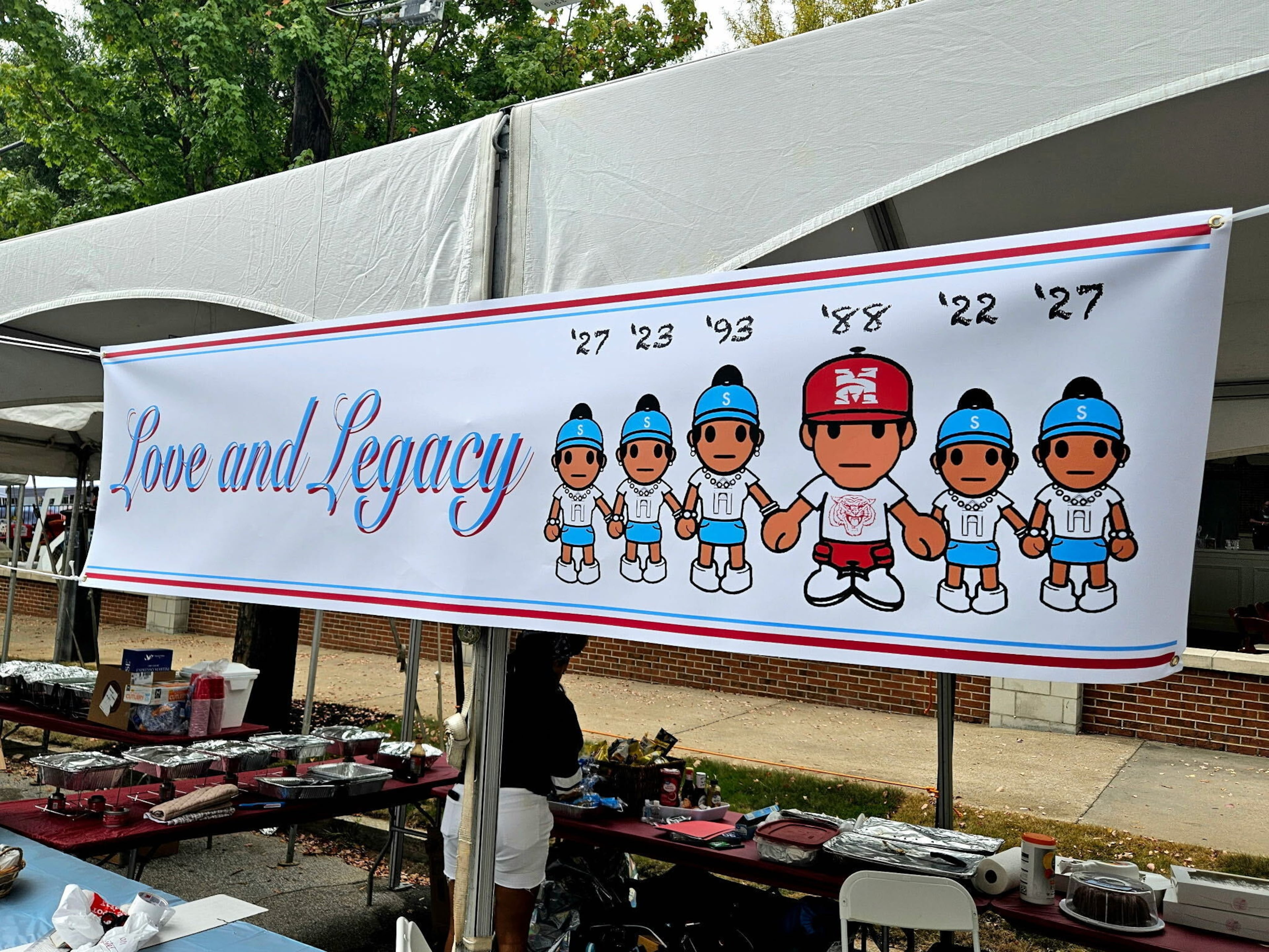 Tent for Dawn Fowler and her family during SpelHouse homecoming 2025. The characters represent her daughters, herself, her husband and his daughters as attendees of Spelman and Morehouse colleges. (Courtesy of Dawn Fowler)