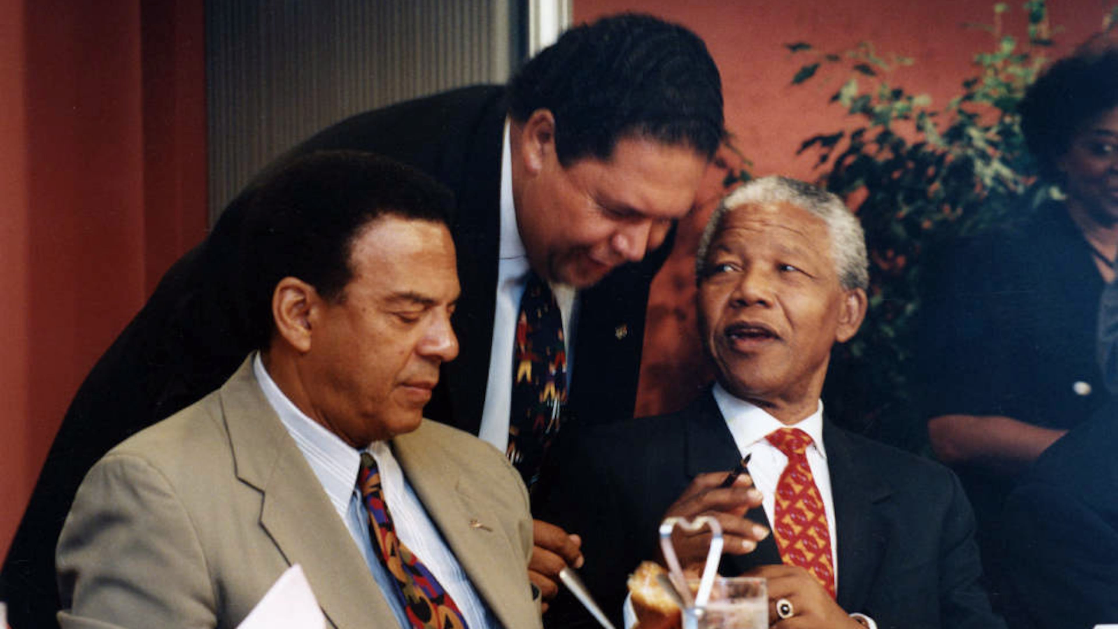 Andrew Young, Maynard Jackson and Nelson Mandela talking together, Atlanta, Georgia, July 12, 1993. (W.A. Bridges/AJC file photo)