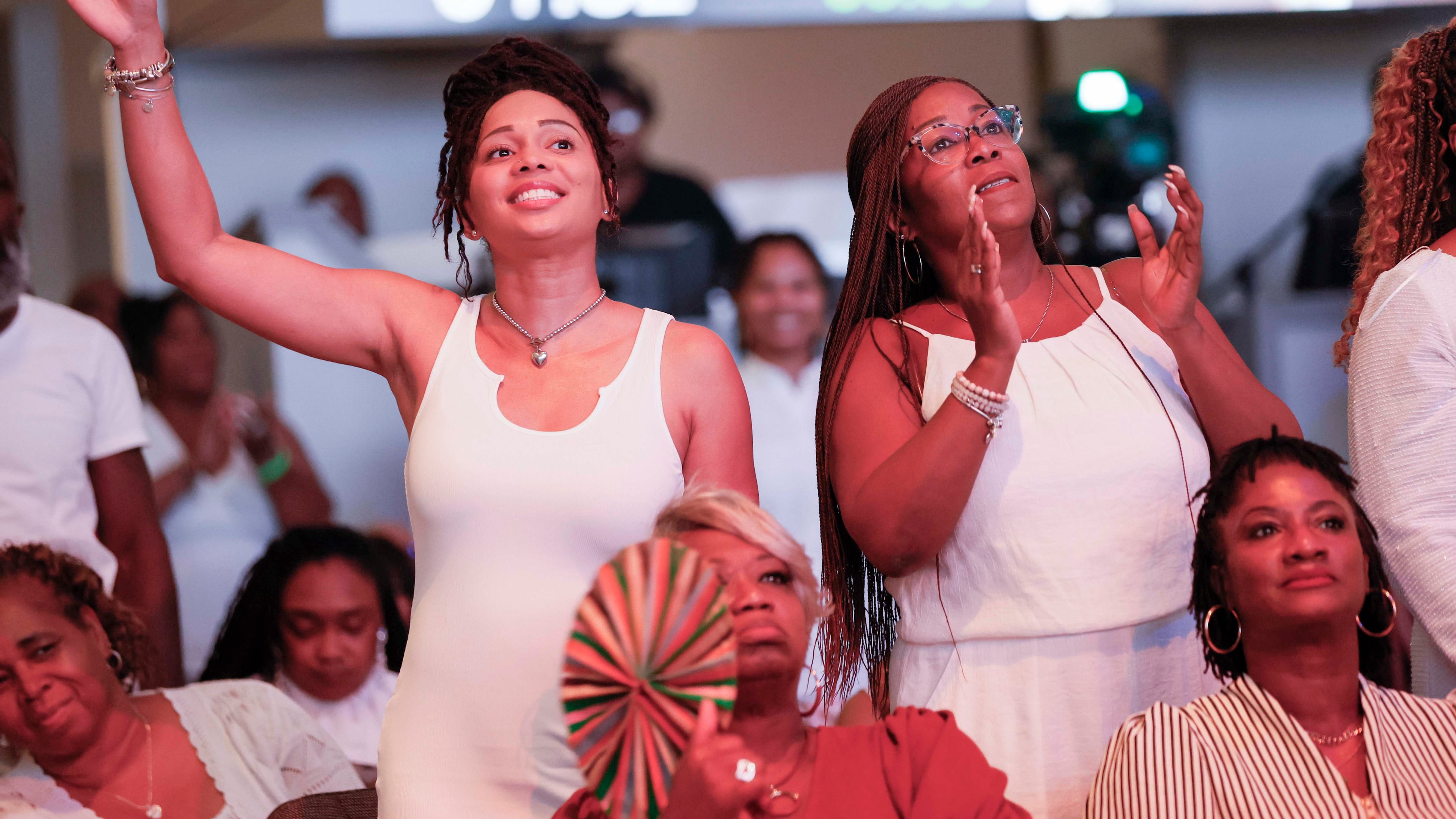 Parishioners sing along with the choir during the 30th pastoral anniversary of Bishop Craig Oliver Sr. at Elizabeth Baptist Church on Sunday, June 8, 2025. (Miguel Martinez/AJC)