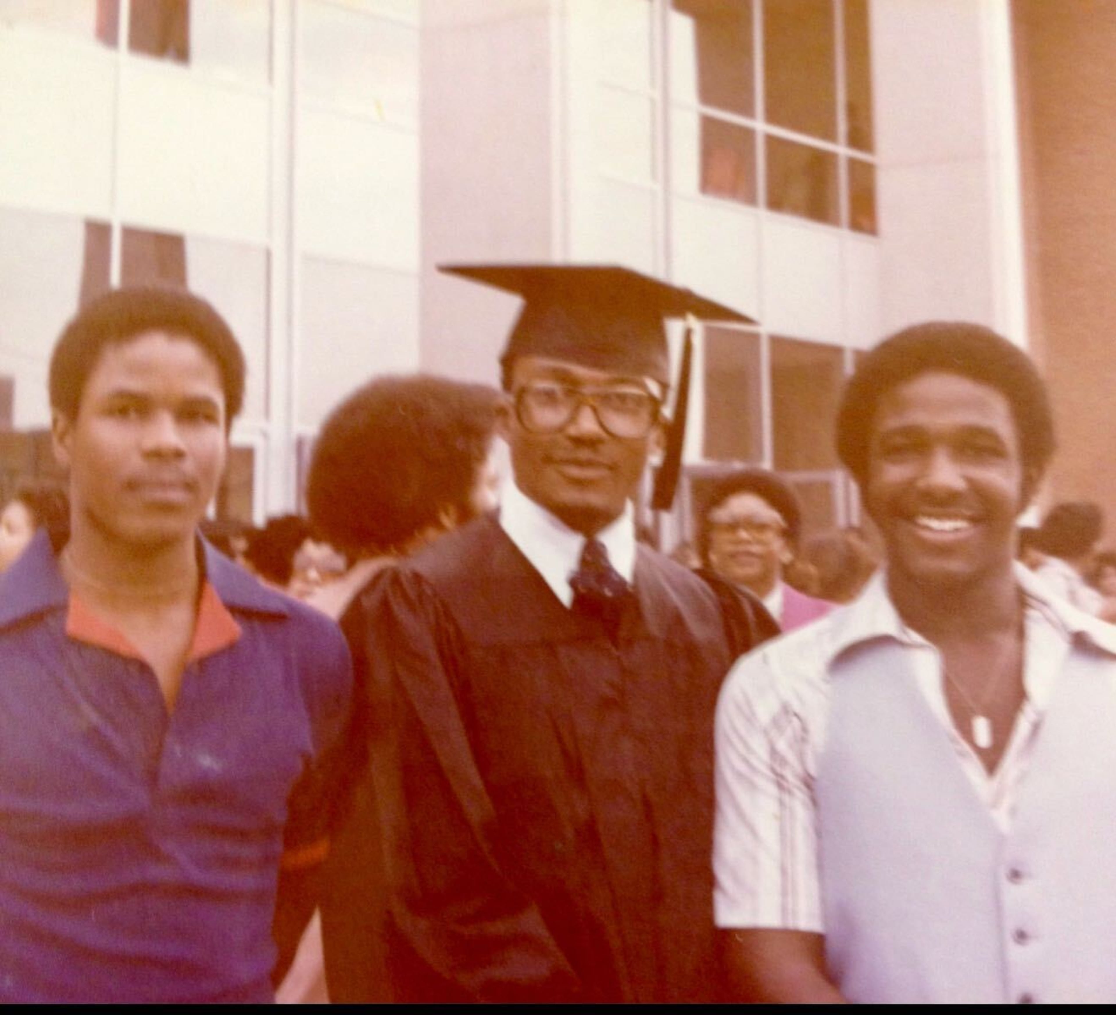 C. David Moody Jr. (center) stands with his brothers during his 1978 graduation from Morehouse College. Moody is the president and CEO of C.D. Moody Construction Co. in Atlanta, the contractor working on The Den at Eight50 West. (Courtesy of C. David Moody Jr.)