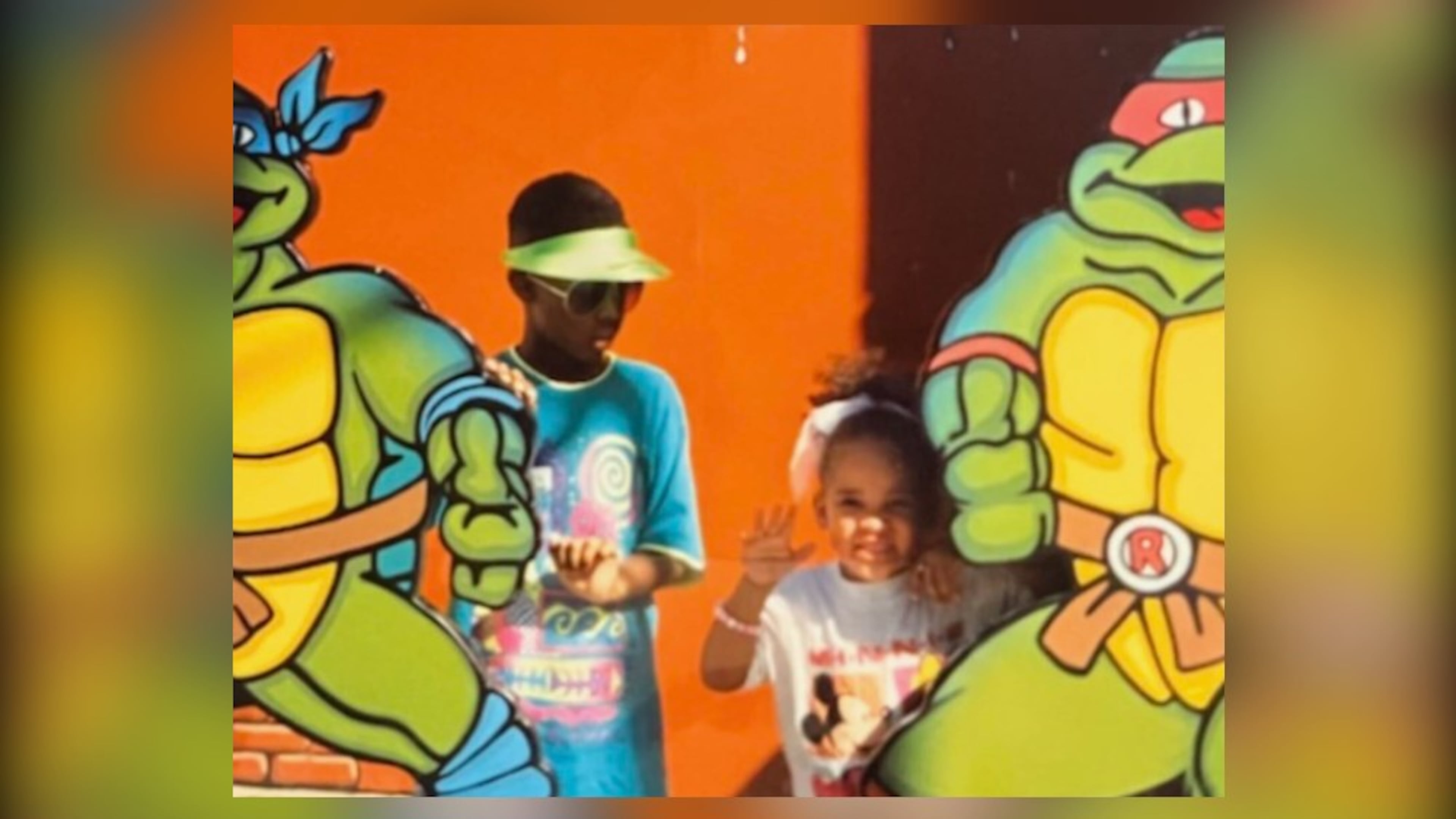 UATL reporter Brooke Leigh Howard (right) poses with her brother, Jamaal, at Universal Studios in Florida in the early 1990s. Five years older than Brooke, Jamaal was both her teacher and protector. (Courtesy of Brooke Leigh Howard)