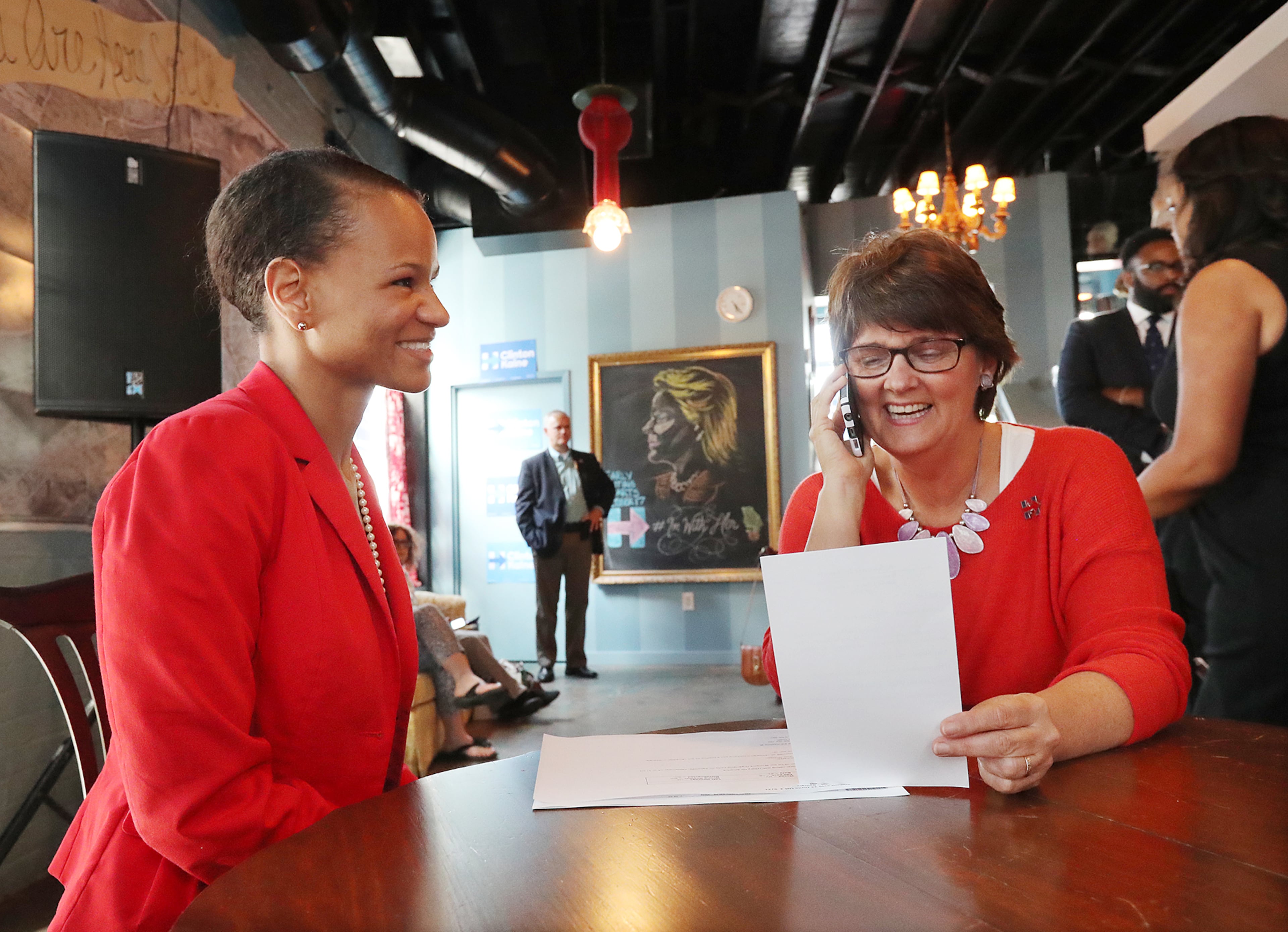State Sen. Adrienne White Carden in 2016 with Anne Holton, the wife of then-Democratic vice presidential nominee Tim Kaine, seen here at a phone banking event for Hillary Clinton in Atlanta. (Curtis Compton/AJC)