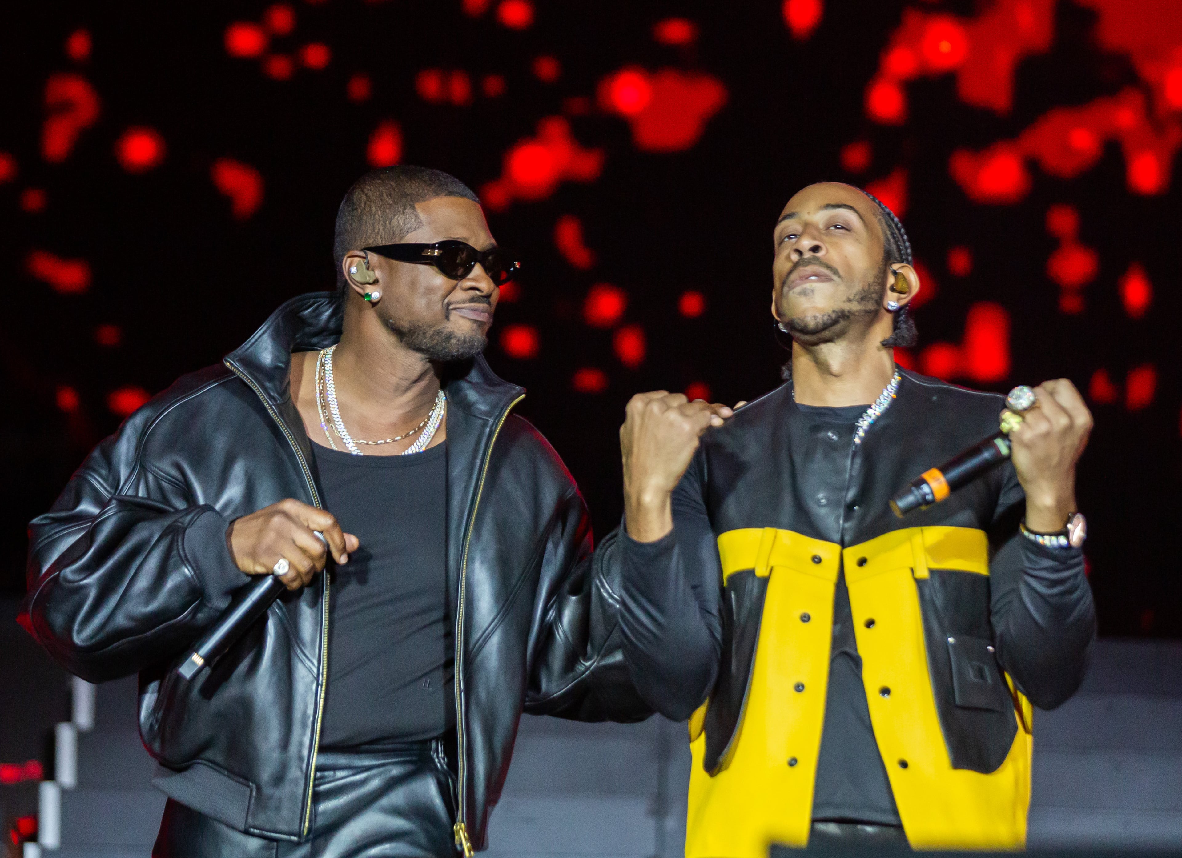 Another of the guest performers with Ludacris (right) on Sunday, Oct. 26, 2025, was Usher, who together performed their hit "Yeah" at One Musicfest at Piedmont Park in Atlanta. (Ryan Fleisher for the AJC)
