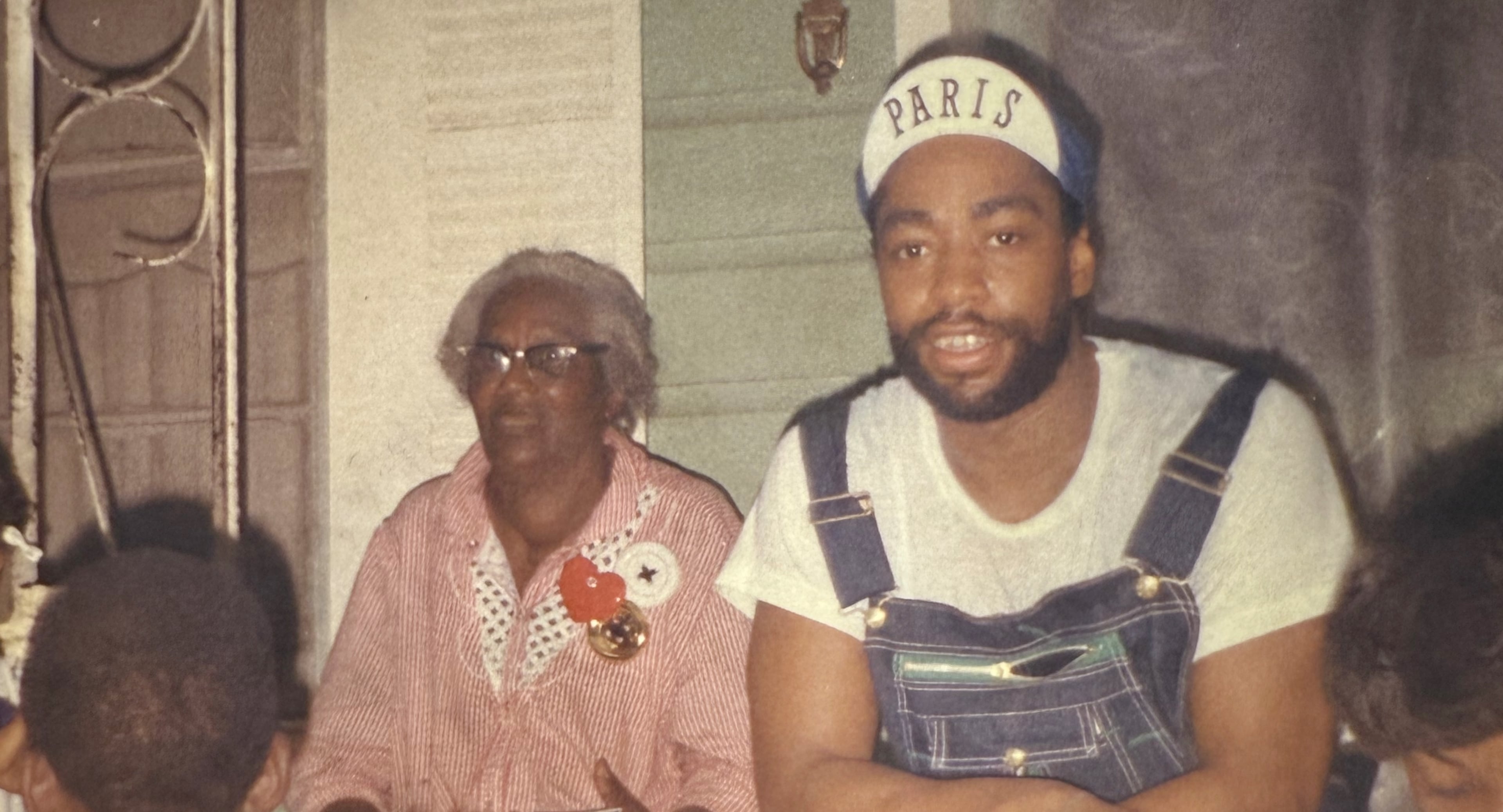 The film discusses Patrick Kelly’s roots in Vicksburg, Mississippi. Here he returns to his grandmother (left) Ethel Rainey's porch, after making it big as a fashion designer in Paris. (Courtesy of "Love, Patrick")
