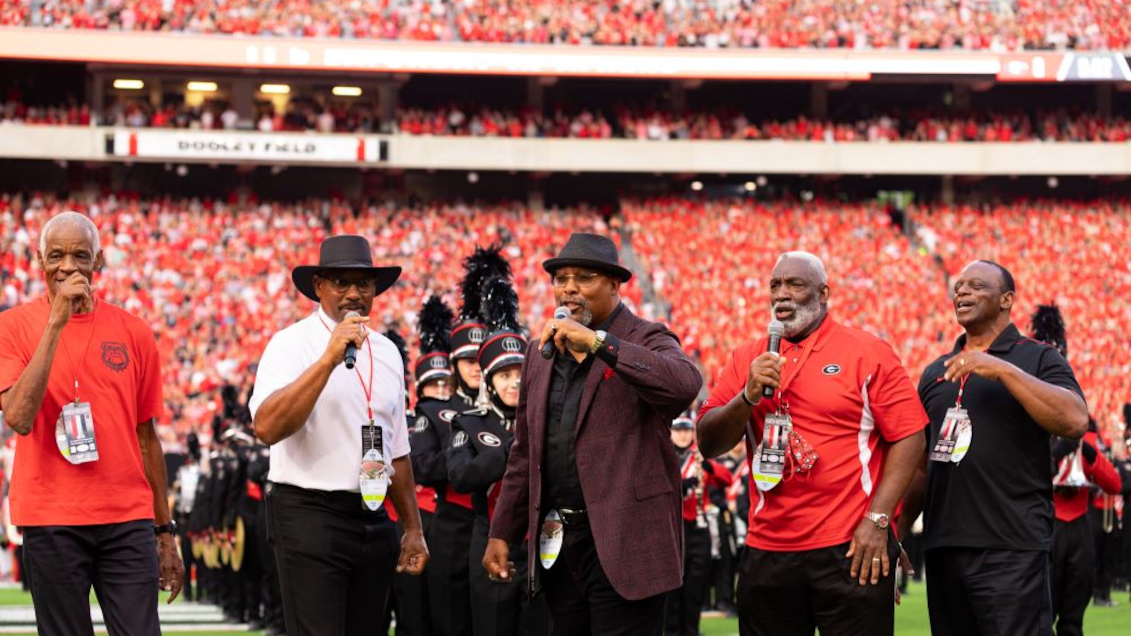 The University of Georgia's first Black football players Richard Appleby, Horace King, Chuck Kinnebrew, Clarence Pope and Larry West celebrate the 50th anniversary of integrating its sports program at Sanford Stadium in Athens, Georgia in 2021. (Courtesy of The Bulldogs Original Five)