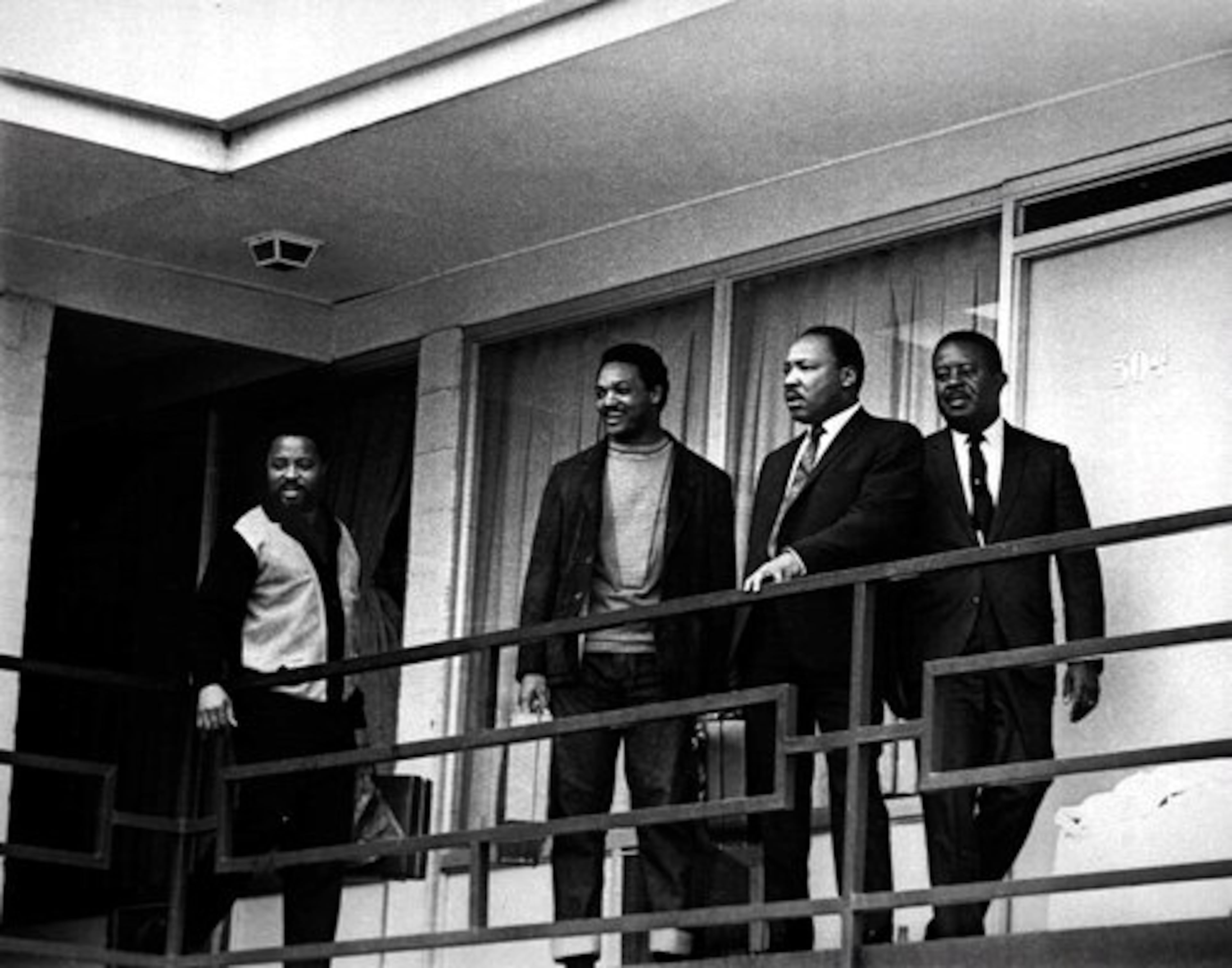 In April 1968, the Rev. Martin Luther King Jr. (second from right) traveled to Memphis, Tenn., to help support striking sanitation workers. On April 3, he stands on the balcony of the Lorraine Motel with (from left) Hosea Williams, Jesse Jackson and Ralph Abernathy. That same day he gave his famous "I've Been to the Mountaintop" speech. He was killed at the motel the following day. (AP 1968)