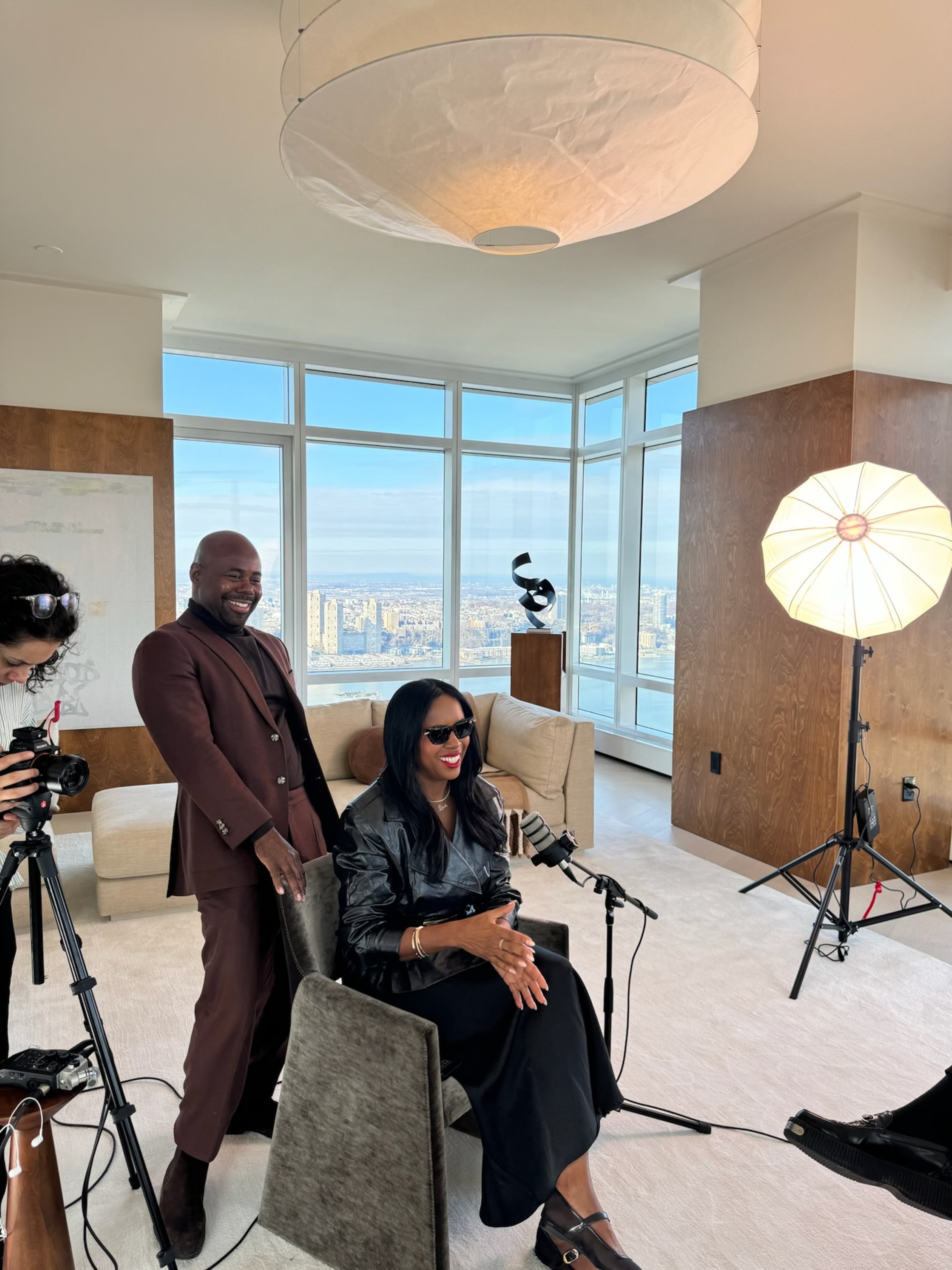 Women have to maintain supportive circles to ensure they stay on track of their goals, says Lee, here getting ready for her podcast "Short & Sweet With Tricia Lee." (Courtesy of Tricia Lee)