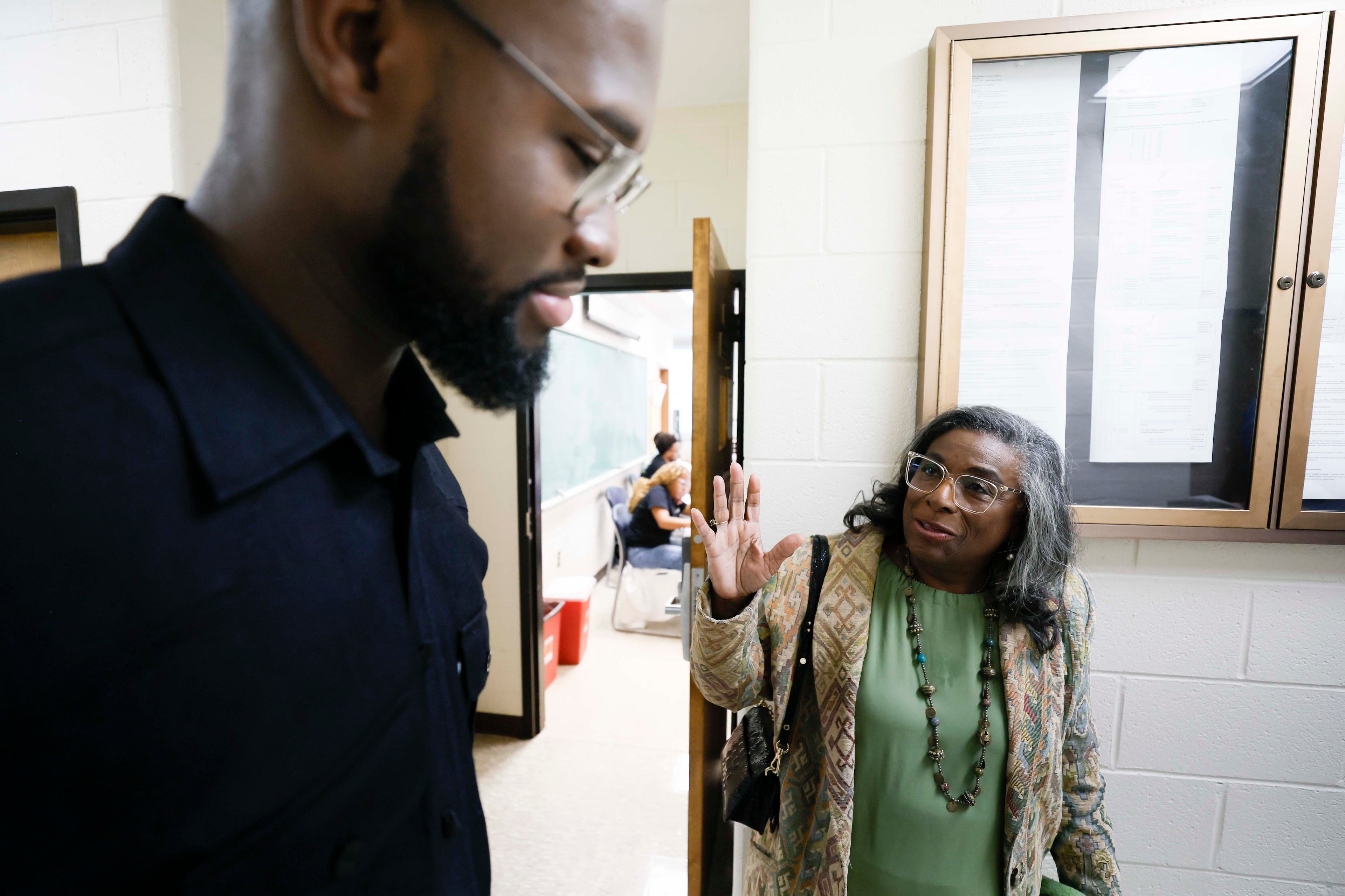 Leah Creque, coach and mentor, and Morehouse Rhodes Scholar Aniaba Jean-Baptiste N’Guessan. (Miguel Martinez/AJC)