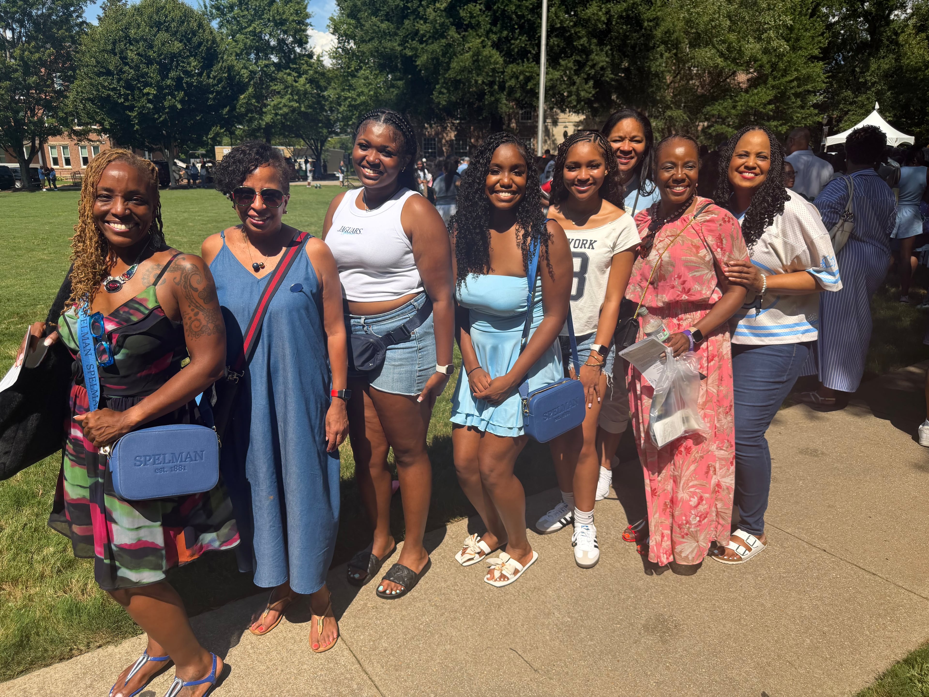 Friends and family celebrate Spelman College incoming student Brooke Spiva (fourth from left) during the Spelman College Parting Ceremony on Aug. 13, 2026. (Courtesy of Yolanda Watson Spiva)