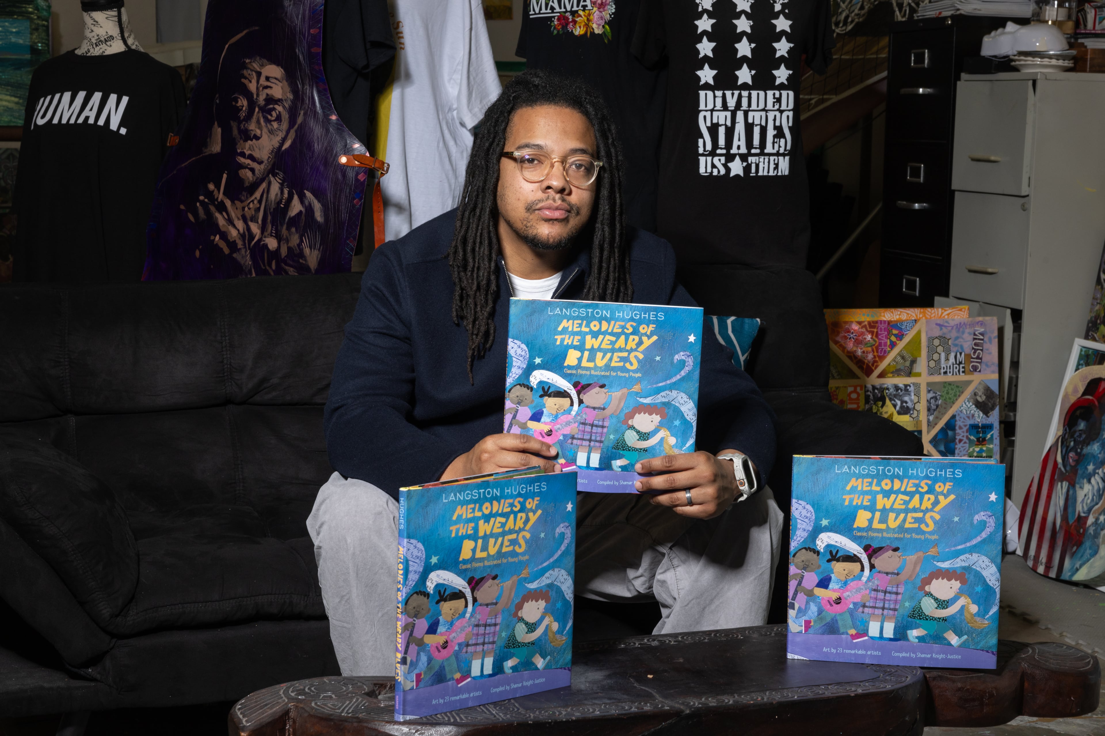 Shamar Knight-Justice edited "Melodies of the Weary Blues," a children's book featuring Langston Hughes’ poems. (Arvin Temkar/AJC)