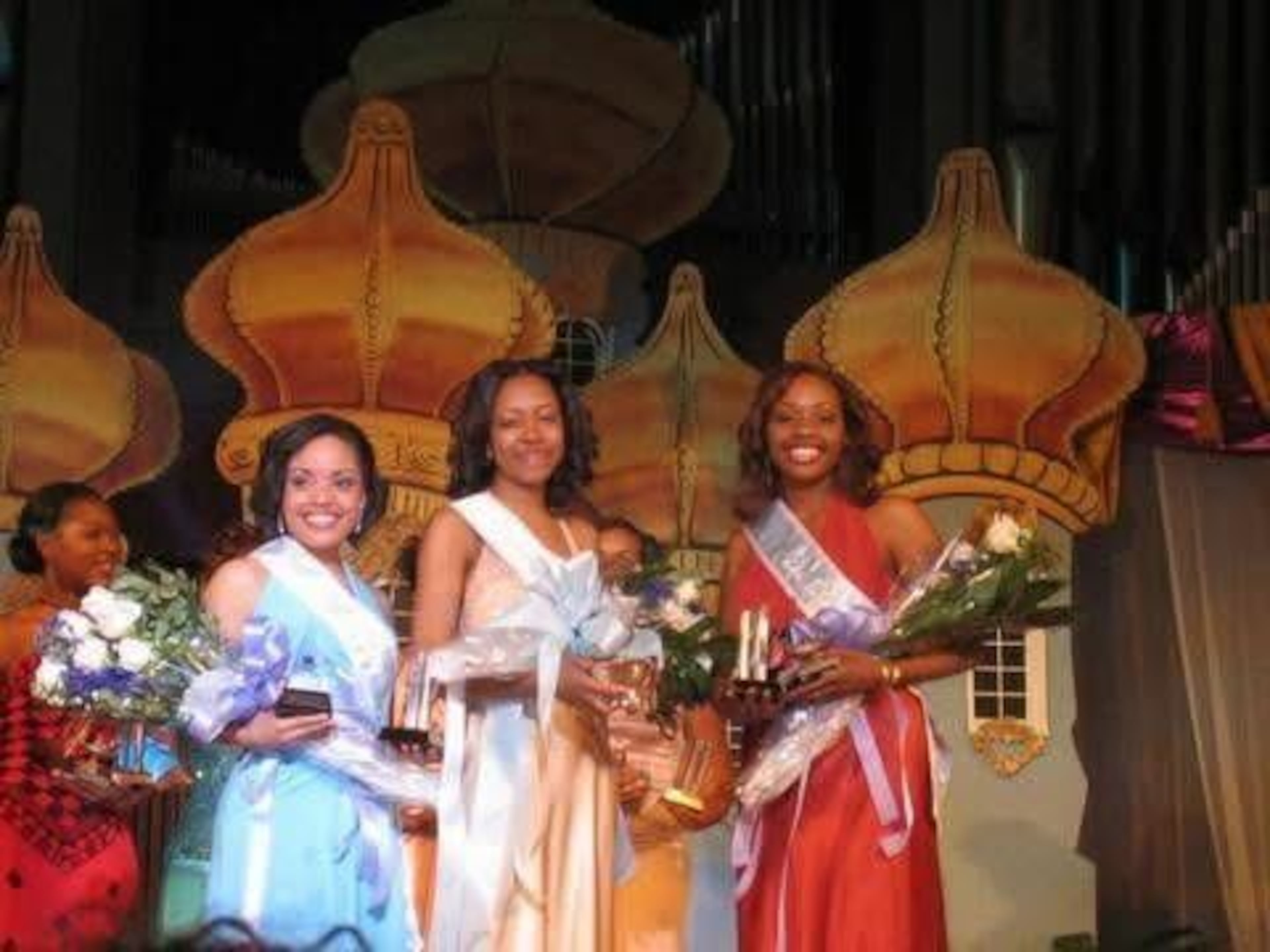 Miss Spelman College 2006 court after initial crowning: (from left) first attendant Ashley Moss, Miss Spelman Terricha Phillips and second attendant Diana Stallworth. (Courtesy of Terricha Phillips)