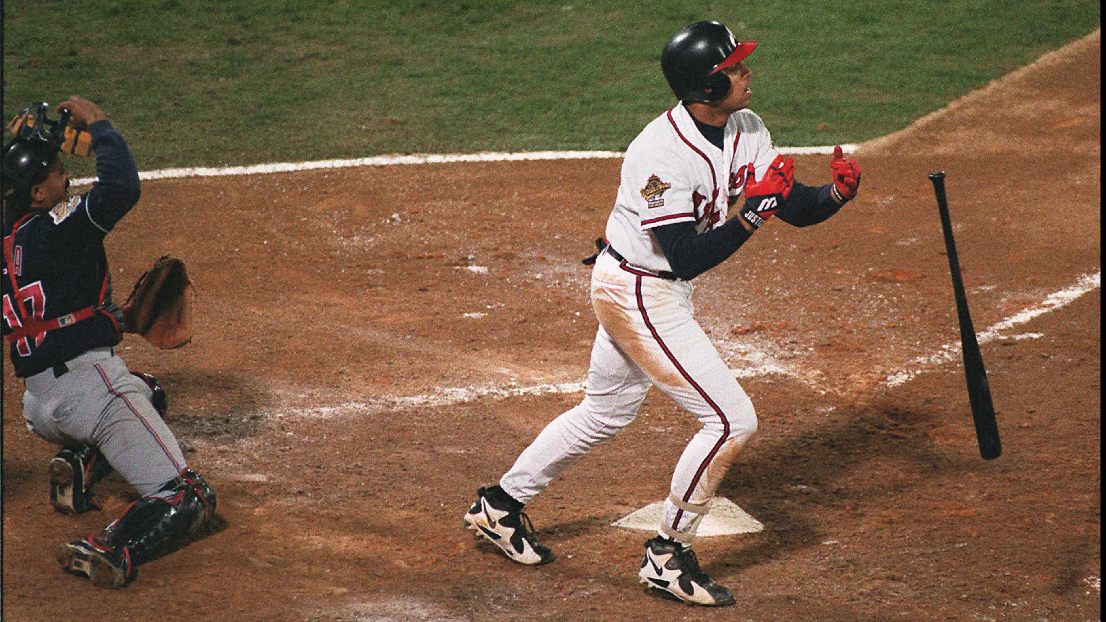 Braves Hall of Famer David Justice follows through on his solo home run which proved to be the only run scored in the 1-0 Game 6 victory. (AJC file)