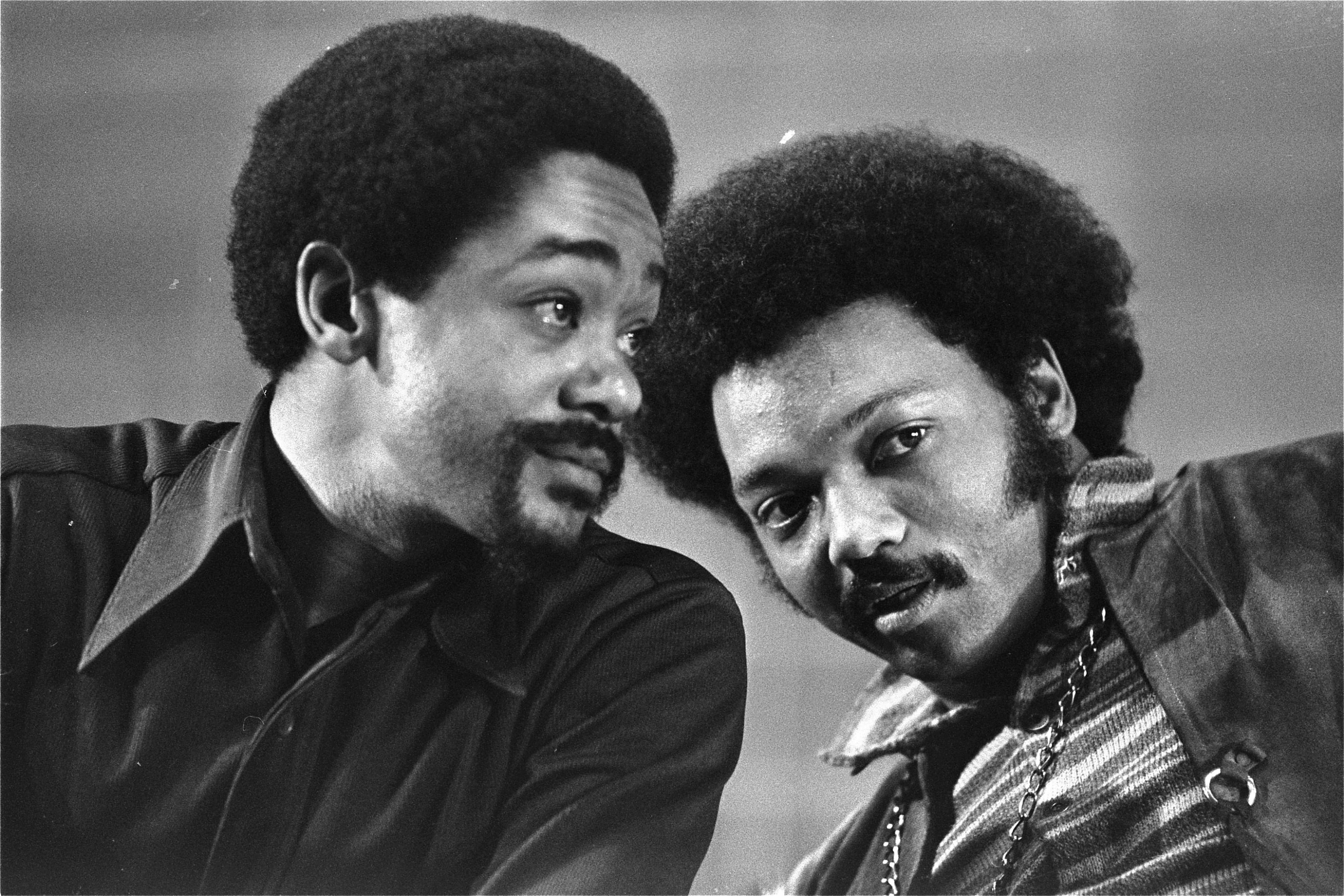 Jackson (right) confers with Bobby Seale, co-founder of the Black Panther Party, at the National Black Political Convention in Gary, Ind. in 1972. (AP file)