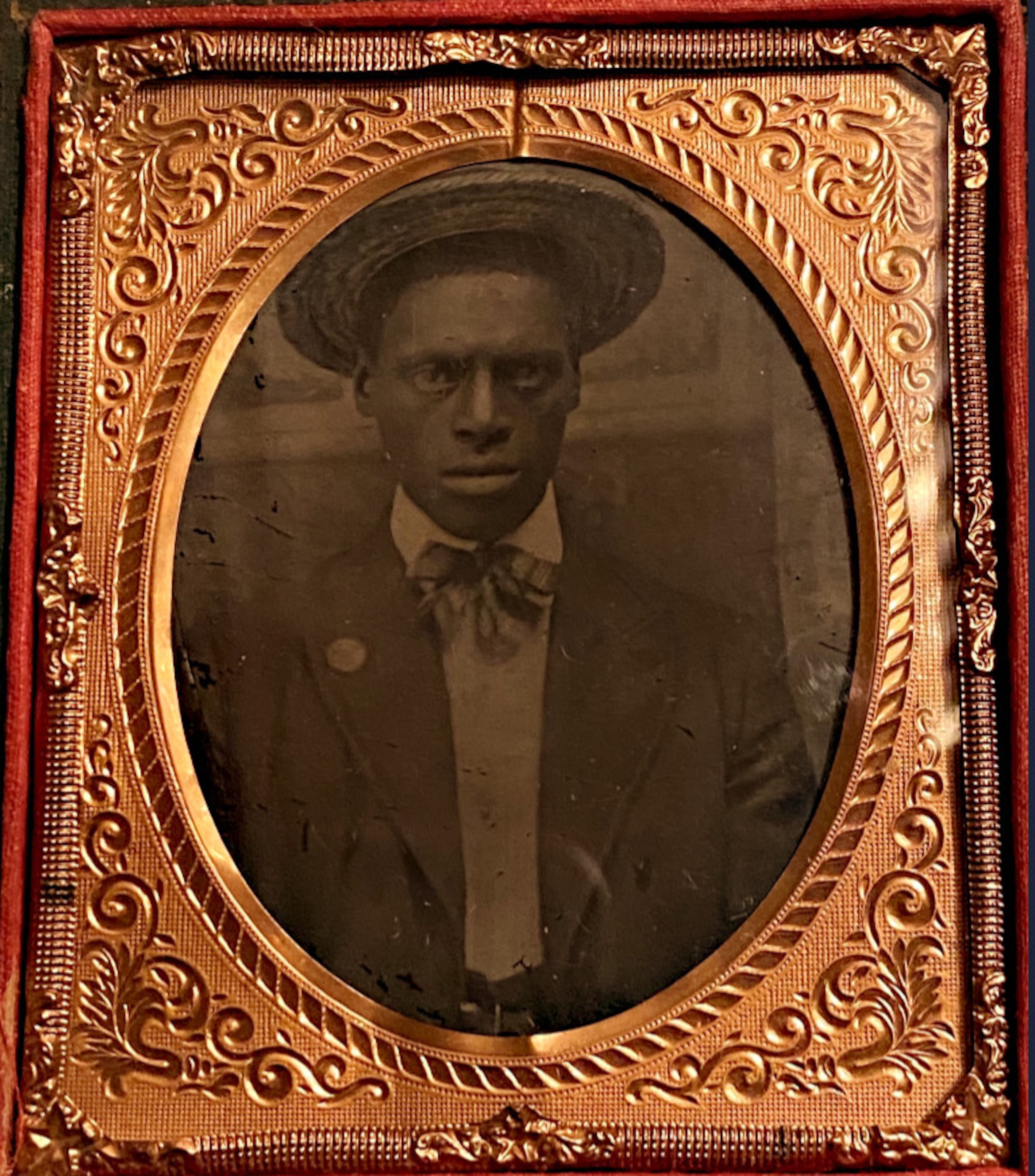 Late 19th century tintype housed in a decorative pressed brass case, depicting an unidentified dapper and poised Black man, c. 1885-1895. (Tanzy A. Ward Antique Photography Archives)