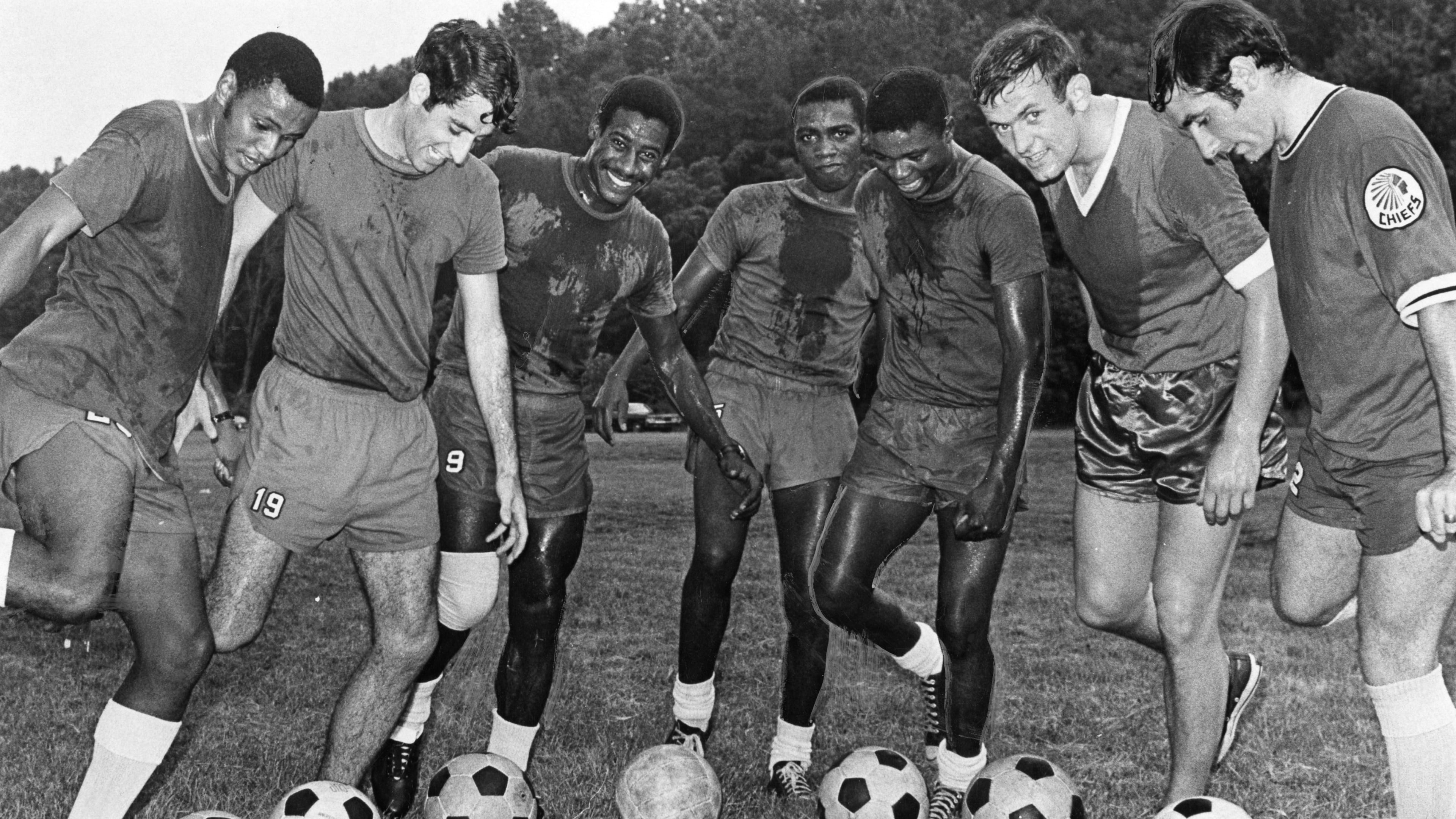 Chief Gunners - The Atlanta Chiefs have suddenly blossomed into one of the top offensive teams in the NASL and the biggest gunners have been these six. Taking aim on goal are (L to R) Boy-Boy Motaung, Nick Papadakis, Everald Cummings, Freddie Mwila, Emment Kapengwe, Graham Newton and Mike Ash. Photo originally ran on July 2, 1969, in the Atlanta Journal. (Robert Connell/AJC 1969)