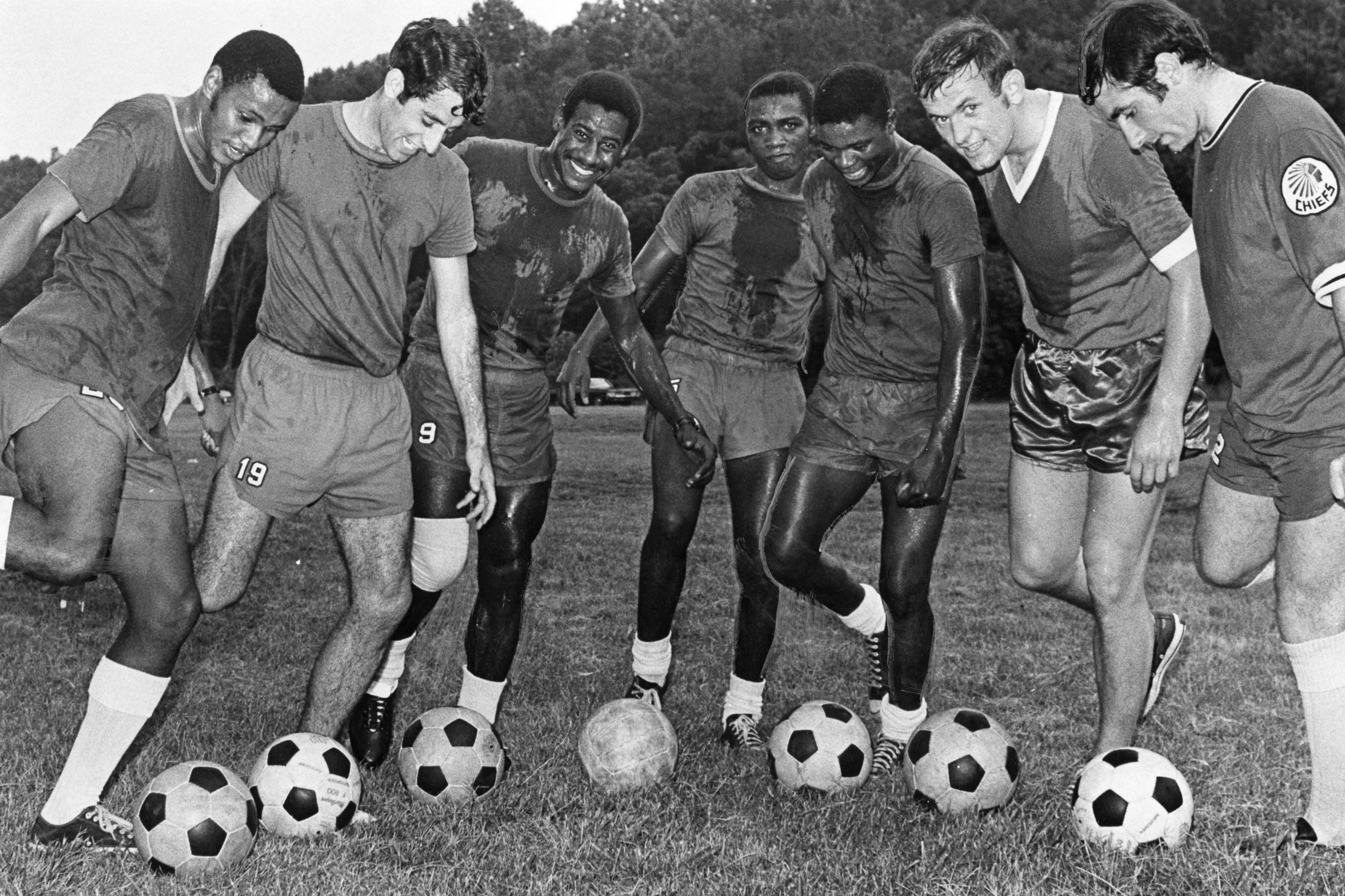 Chief Gunners - The Atlanta Chiefs have suddenly blossomed into one of the top offensive teams in the NASL and the biggest gunners have been these six. Taking aim on goal are (L to R) Boy-Boy Motaung, Nick Papadakis, Everald Cummings, Freddie Mwila, Emment Kapengwe, Graham Newton and Mike Ash. Photo originally ran on July 2, 1969, in the Atlanta Journal. (Robert Connell/AJC 1969)