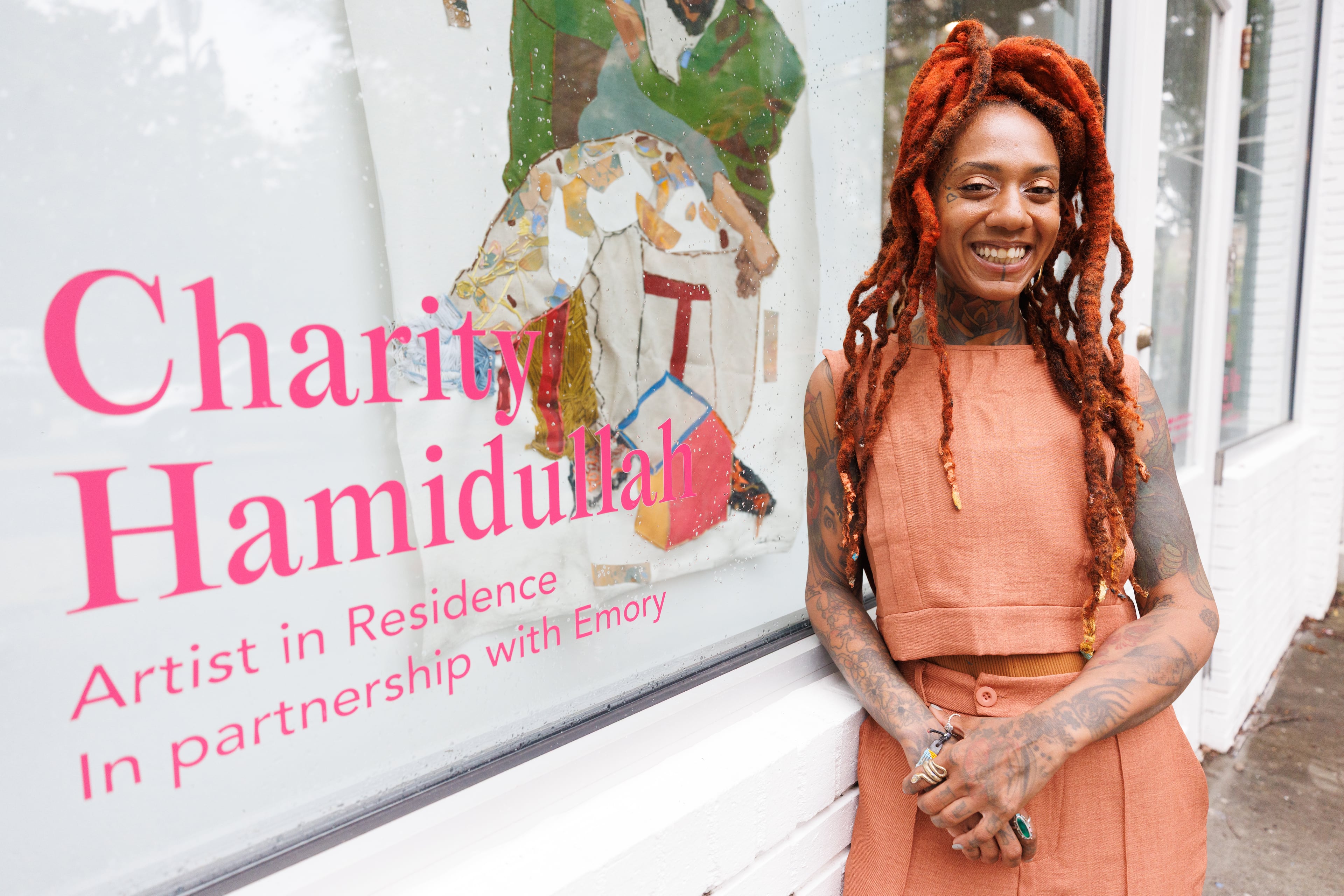 Multifaceted artist and muralist Charity Hamidullah, shown on Wednesday, May 27, 2026, splits her time between street artist and working in her studio in Midtown Atlanta. Hamidullah’s latest projects include collaborating a piece for the reopening of the old CNN Center. (Estela Muñoz/AJC)