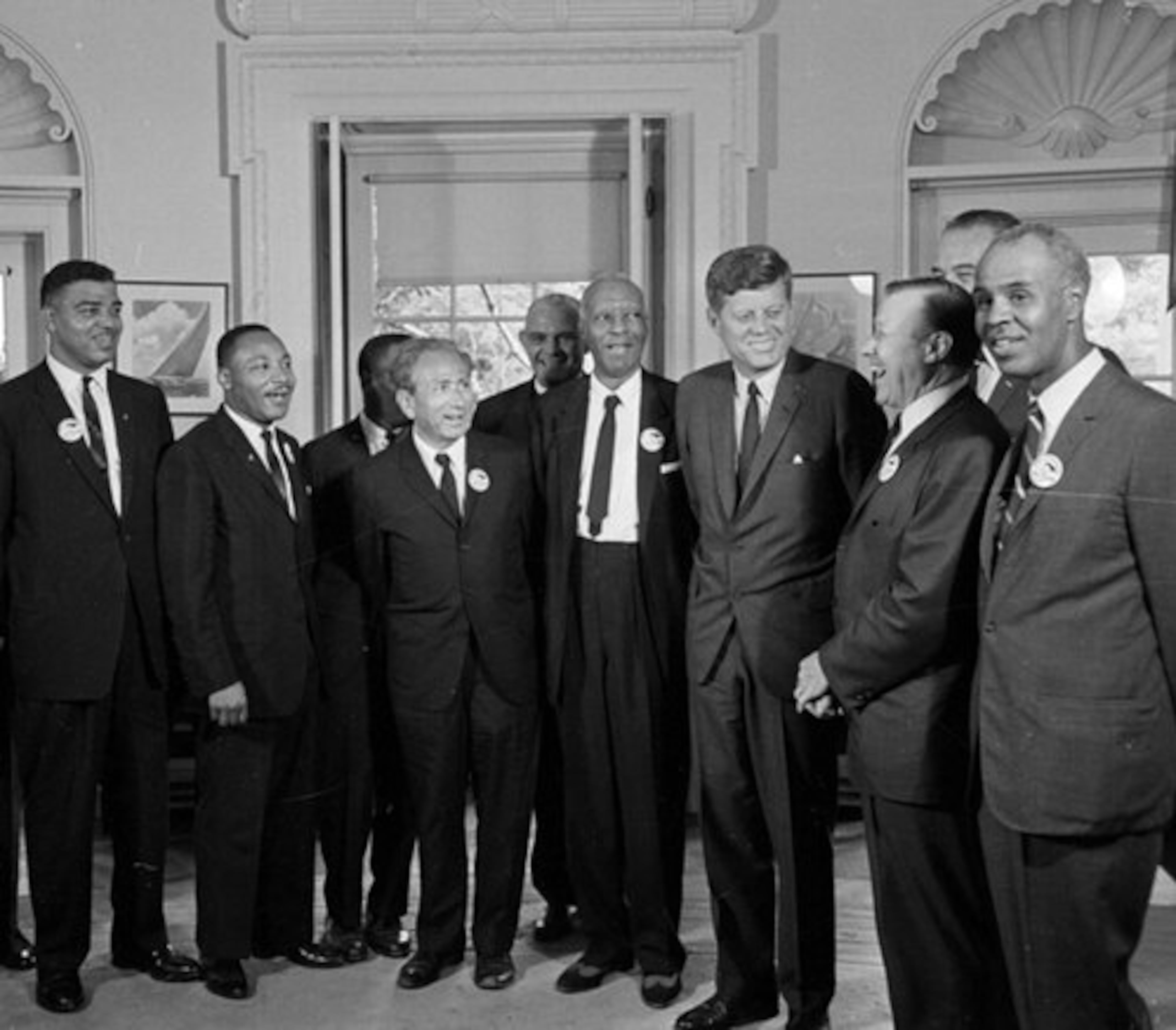 1963: President Kennedy poses at the White House with a group of leaders of the March on Washington. (From left) Whitney Young, Dr. Martin Luther King Jr., John Lewis, Rabbi Joachim Prinz, Dr. Eugene P. Donnelly, A. Philip Randolph, Kennedy; Walter Reuther, Vice-President Johnson (rear), and Roy Wilkins. (AP)