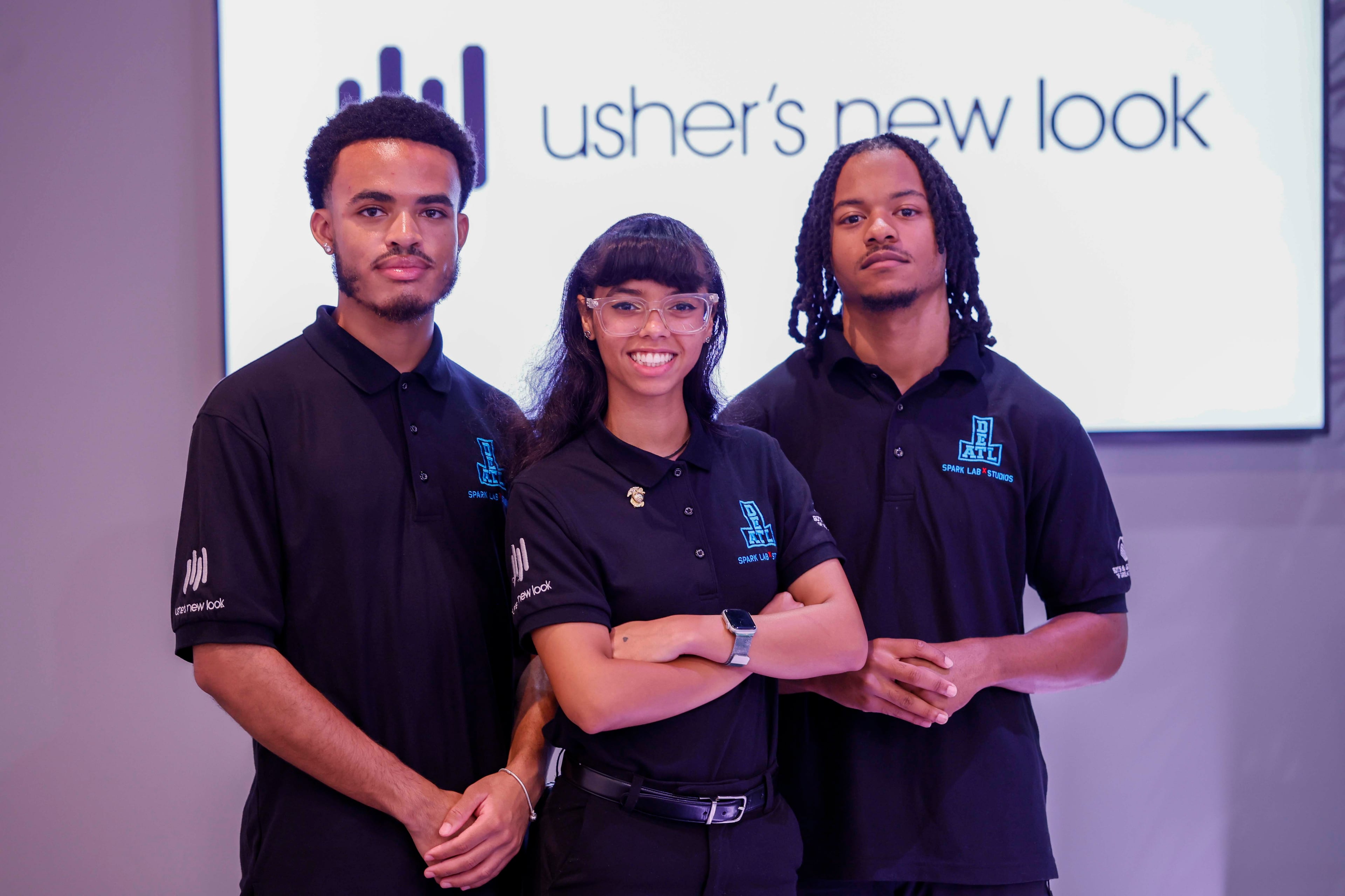 (From left) Mi’Cai Haywood, 20, Sarah Swift, 21 and Storm Smith, 21, are the new employees of Usher’s nonprofit, Usher’s New Look. They were interns on Usher’s R&B Tour with Chris Brown and secured their positions after two months on the road. (Miguel Martinez/AJC)
