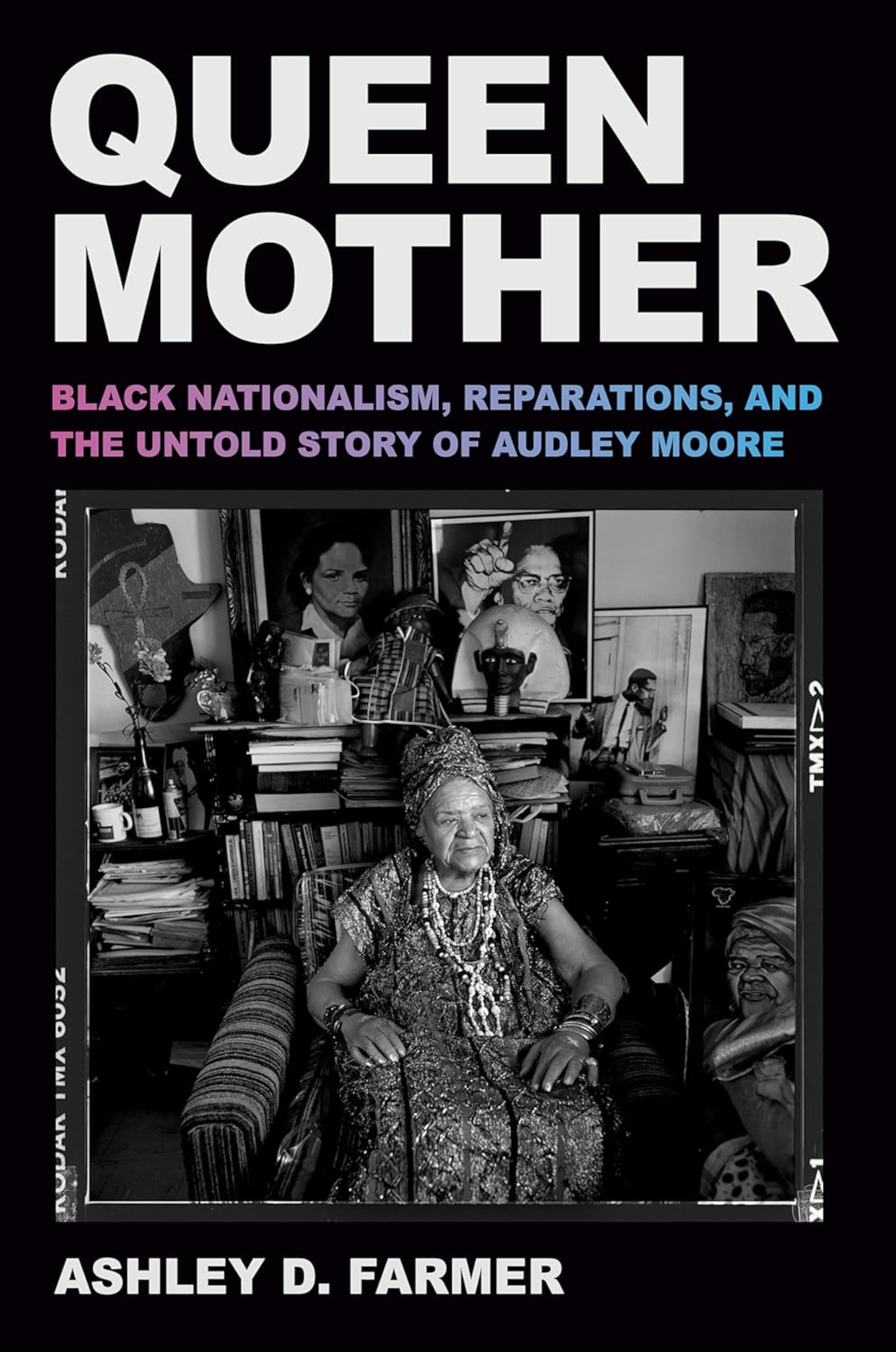 The cover of “Queen Mother: Black Nationalism, Reparations, and the Untold Story of Audley Moore,” shows her surrounded by books and files, which no one knows where to find today. (Courtesy of Pantheon)
