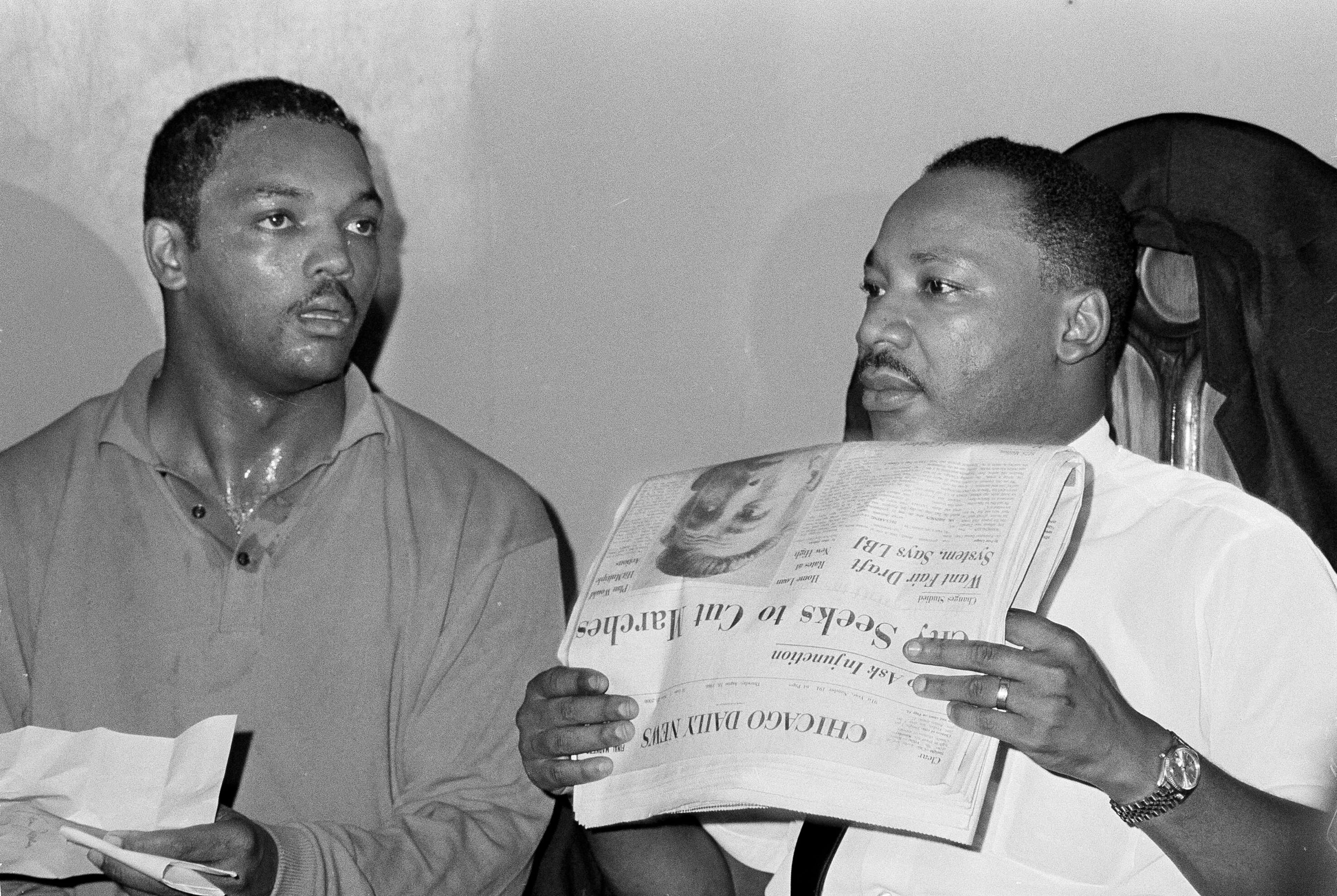 Jackson (left) was an aide to civil rights leader Dr. Martin Luther King, Jr. Here, they are seen in Chicago, Aug. 19, 1966. (Larry Stoddard/AP)