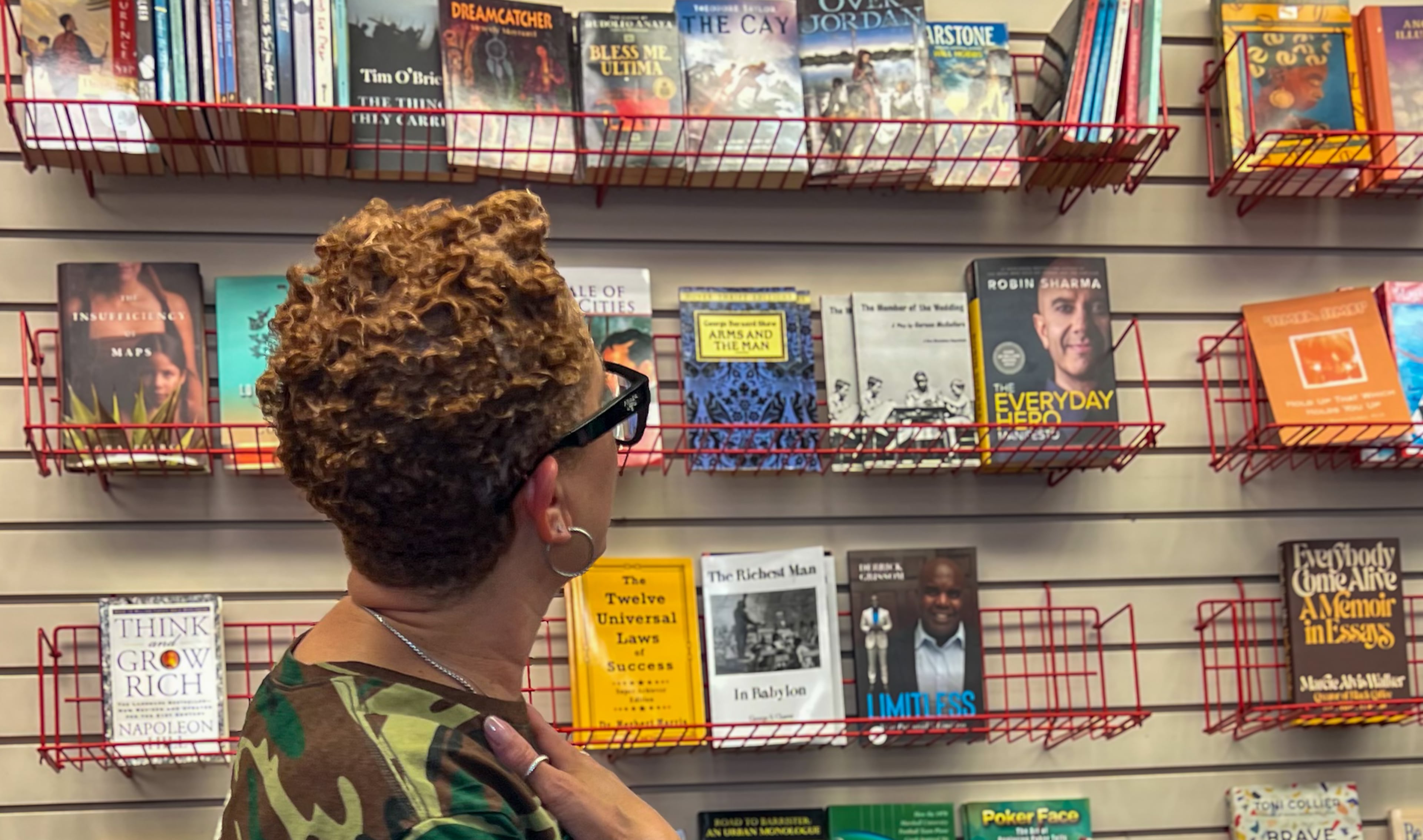 A customer browses at Medu Bookstore at Greenbriar Mall on Saturday, Feb. 21, 2026. (Courtesy of Gerel Thomas)