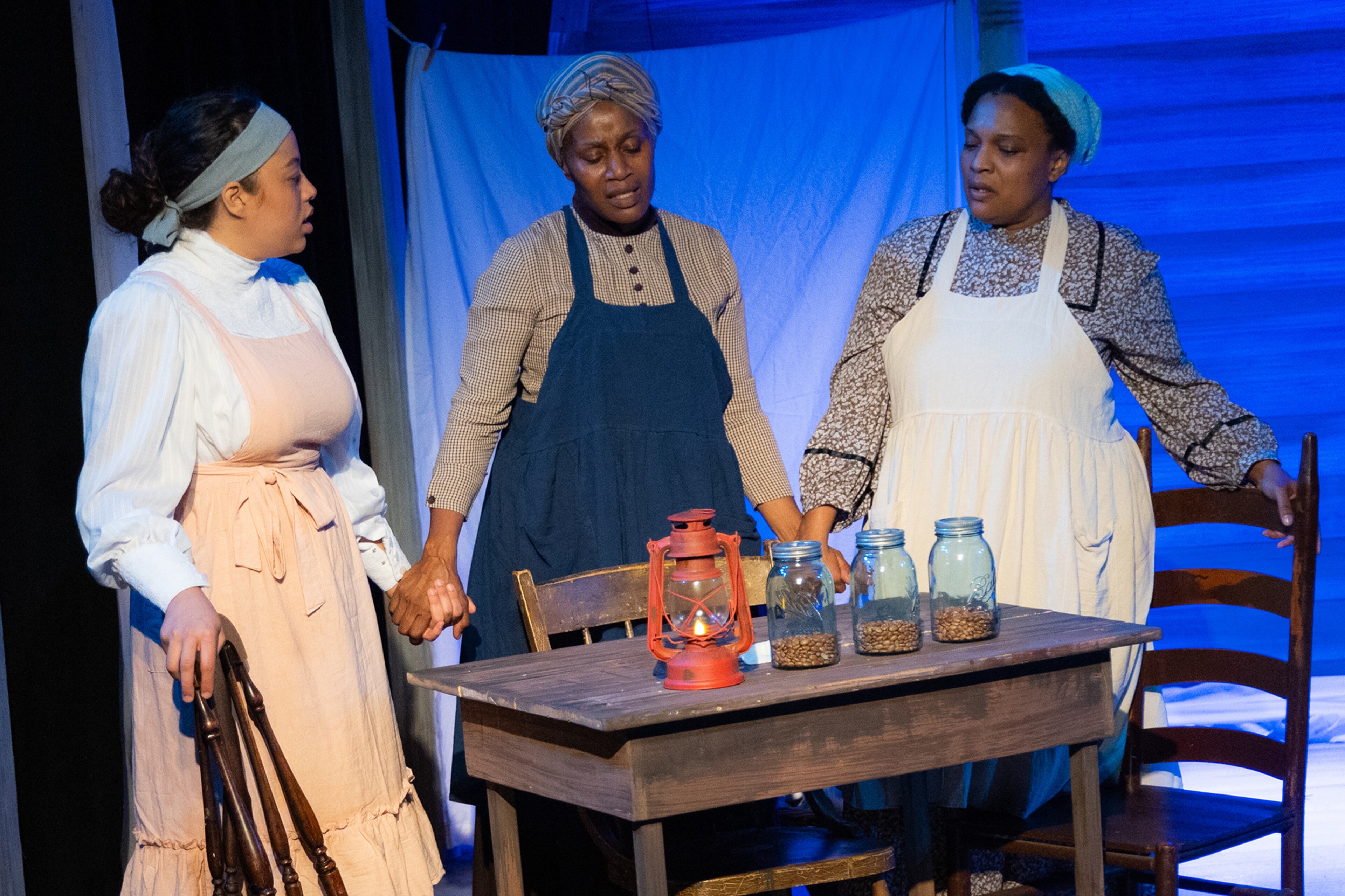 Kenedi Deal, Nevaina and Tanya Freeman star in “The Wash,” which is playing at both Synchronicity Theatre and Impact Theatre this summer. (Courtesy of Casey Gardner Ford)