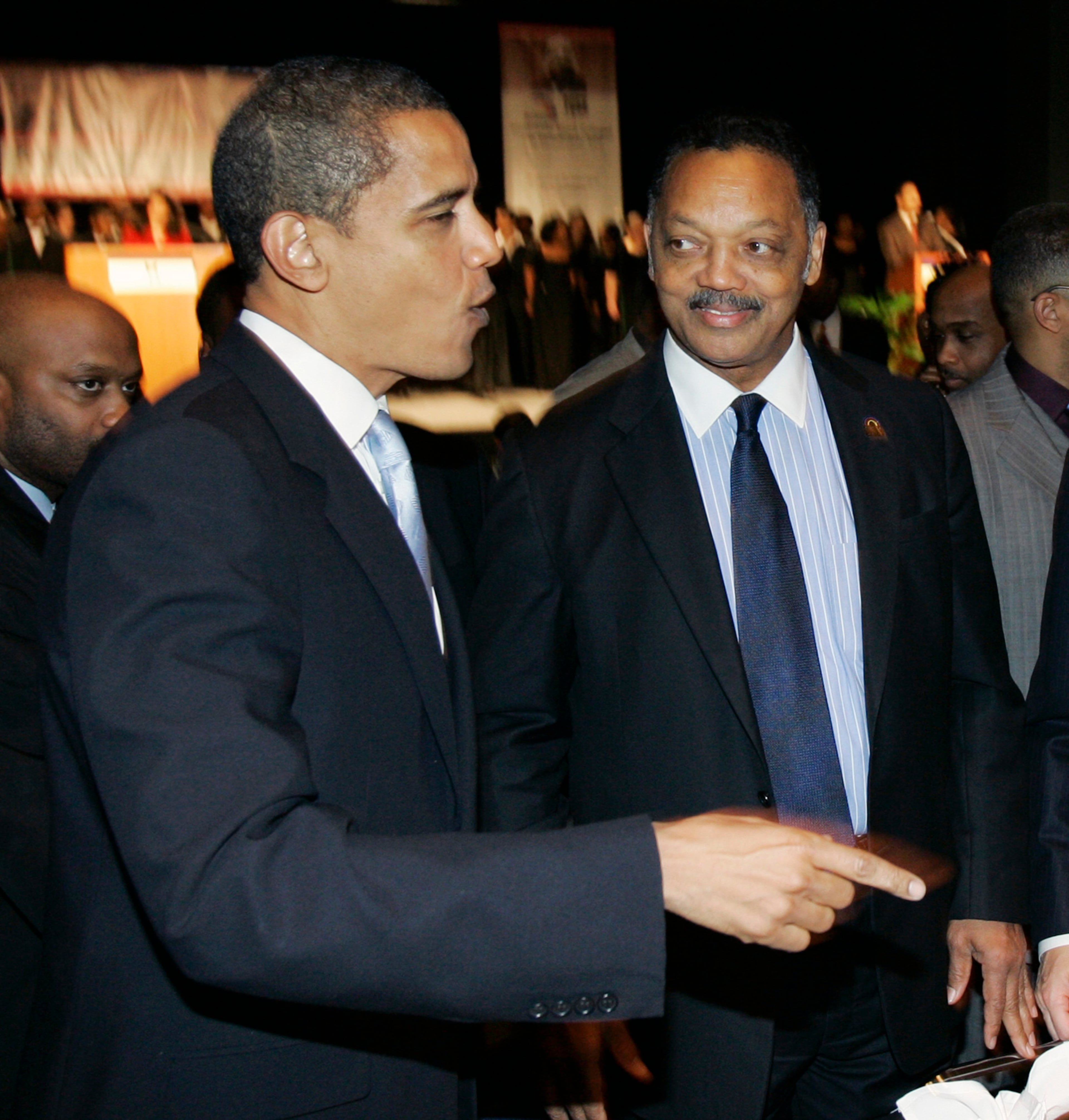 Then-Democratic presidential hopeful Sen. Barack Obama, D-Ill. (left) and the Rev. Jesse Jackson are seen at the Rev. Dr. Martin Luther King Jr. Scholarship Awards Breakfast in Chicago on Jan. 15, 2007. (Charles Rex Arbogast/AP)