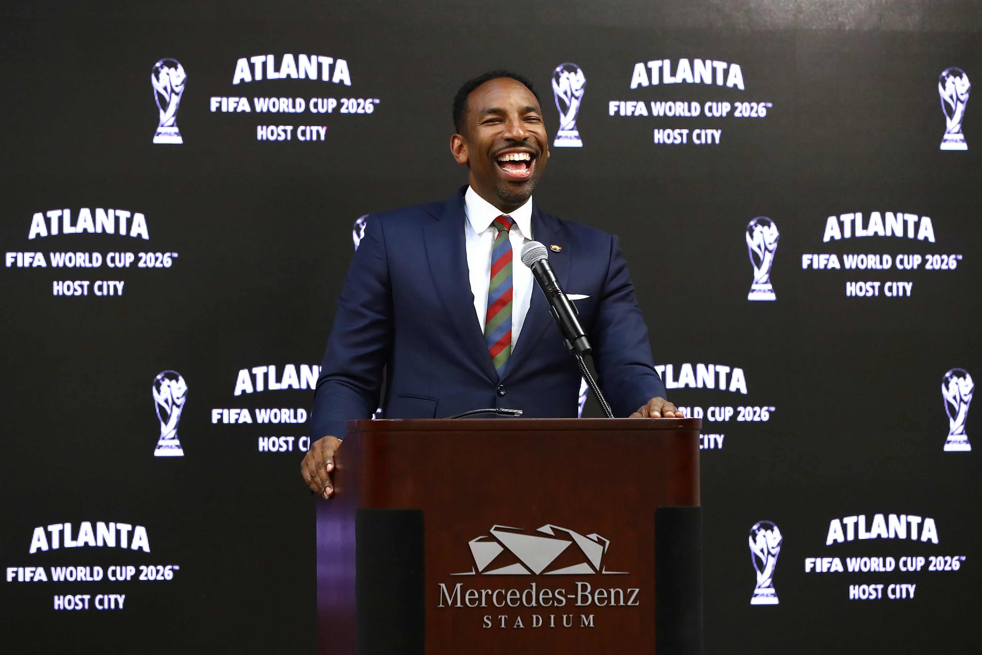 Mayor Andre Dickens is all smiles reacting during the Host City announcement press conference for the 2026 World Cup at Mercedes-Benz Stadium on Thursday, June 16, 2022, in Atlanta. (AJC 2022)