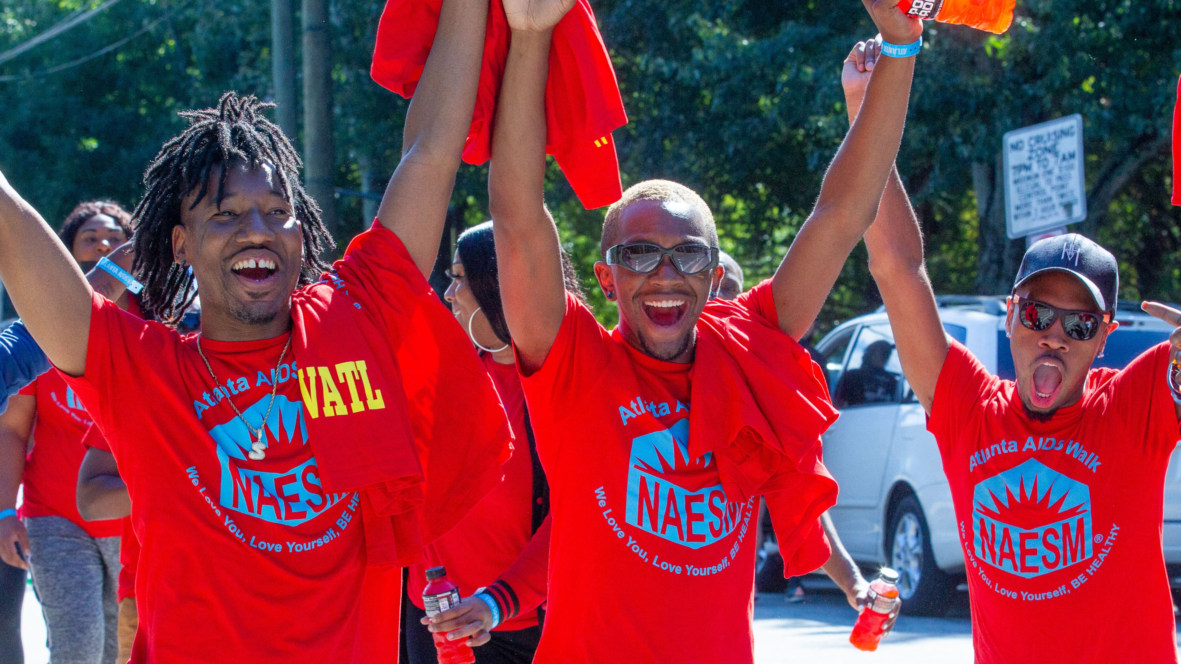 Walkers head up 10th Street at the start of the AIDS Walk Atlanta on Saturday, Sept. 25, 2021. ( Steve Schaefer for the AJC)