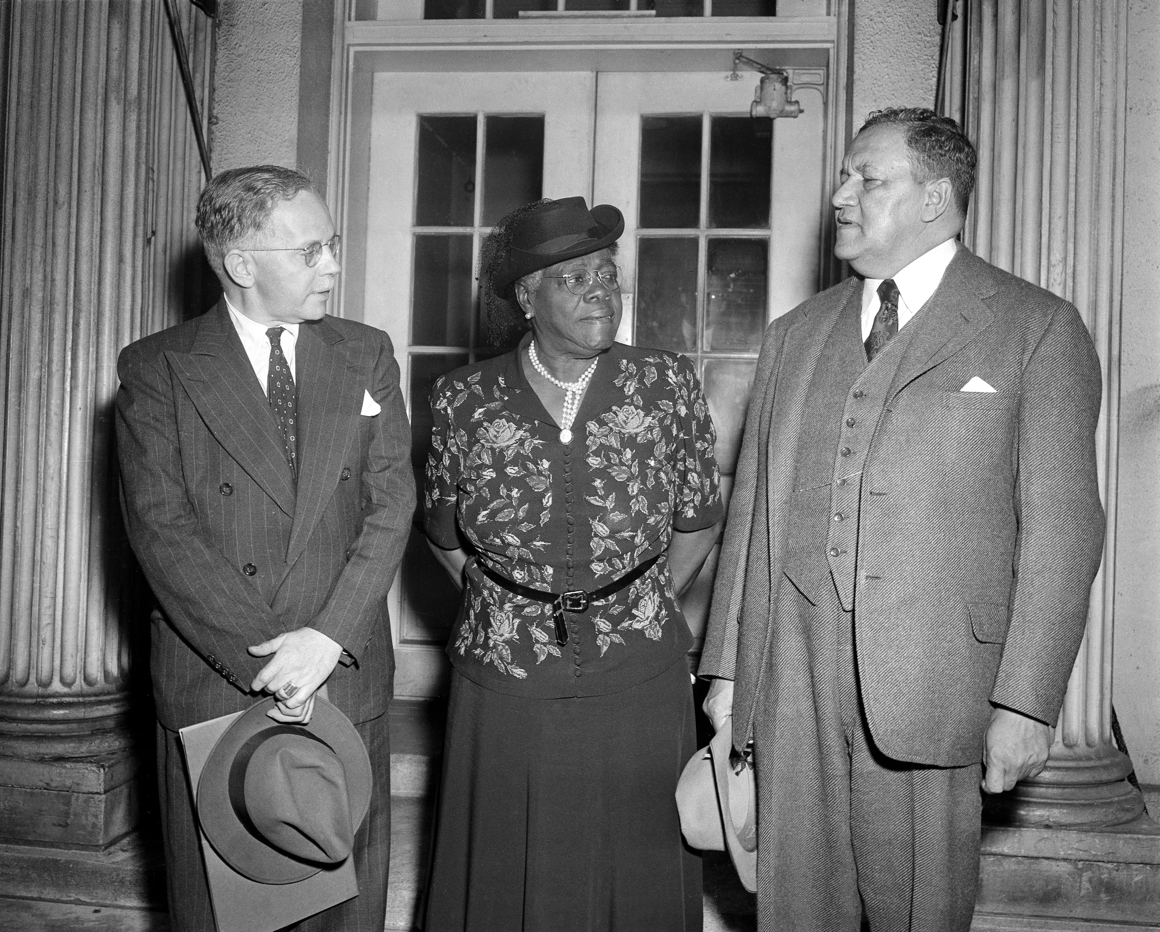 Walter White, left, executive secretary of the NAACP, Mary McLeod Bethune and Dr. Channing H. Tobias are shown as they leave the White House after a conference with President Franklin D. Roosevelt, Sept. 29, 1944. (John Rous/AP)